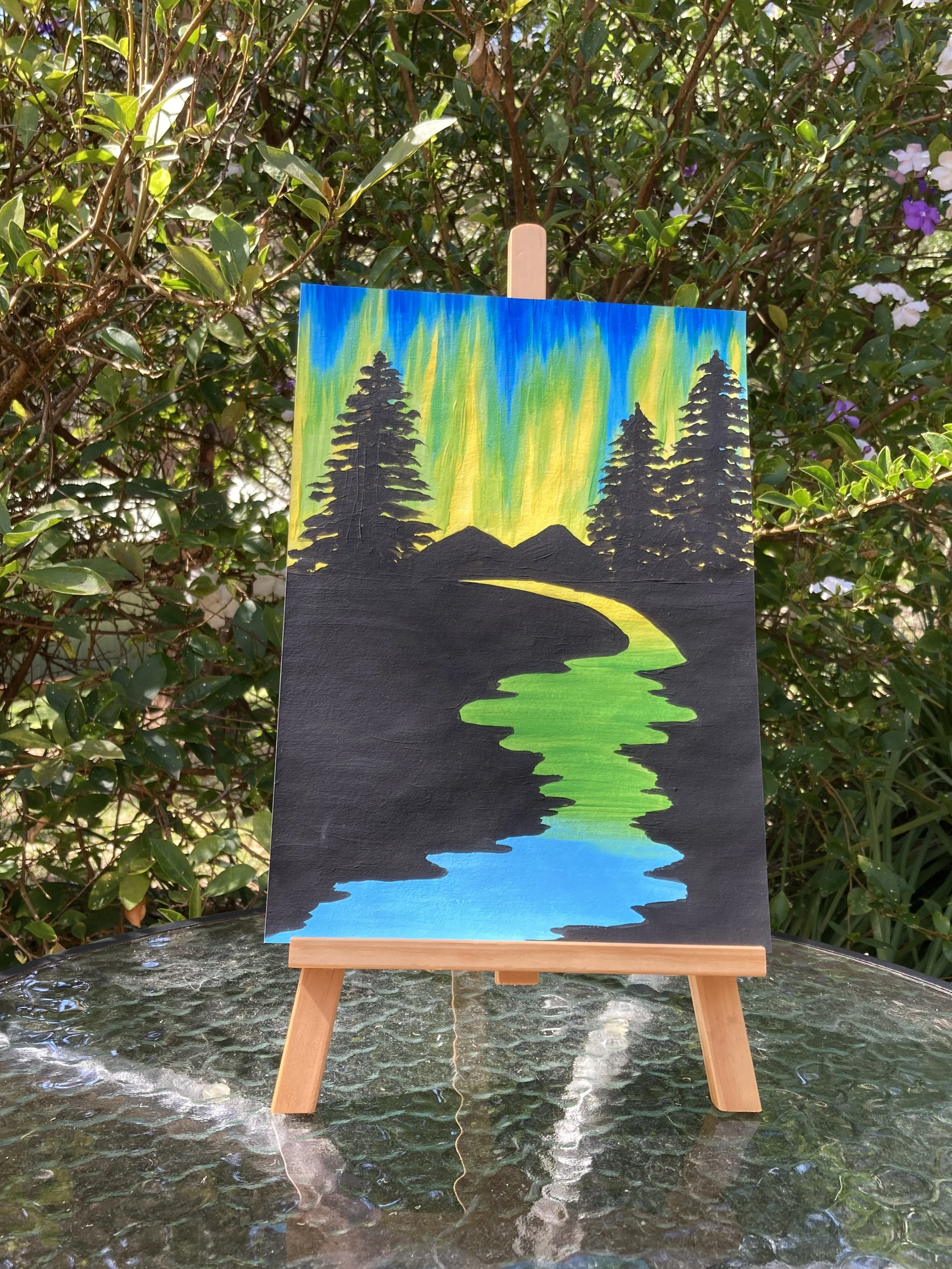 Aurora Skies on easel.JPG