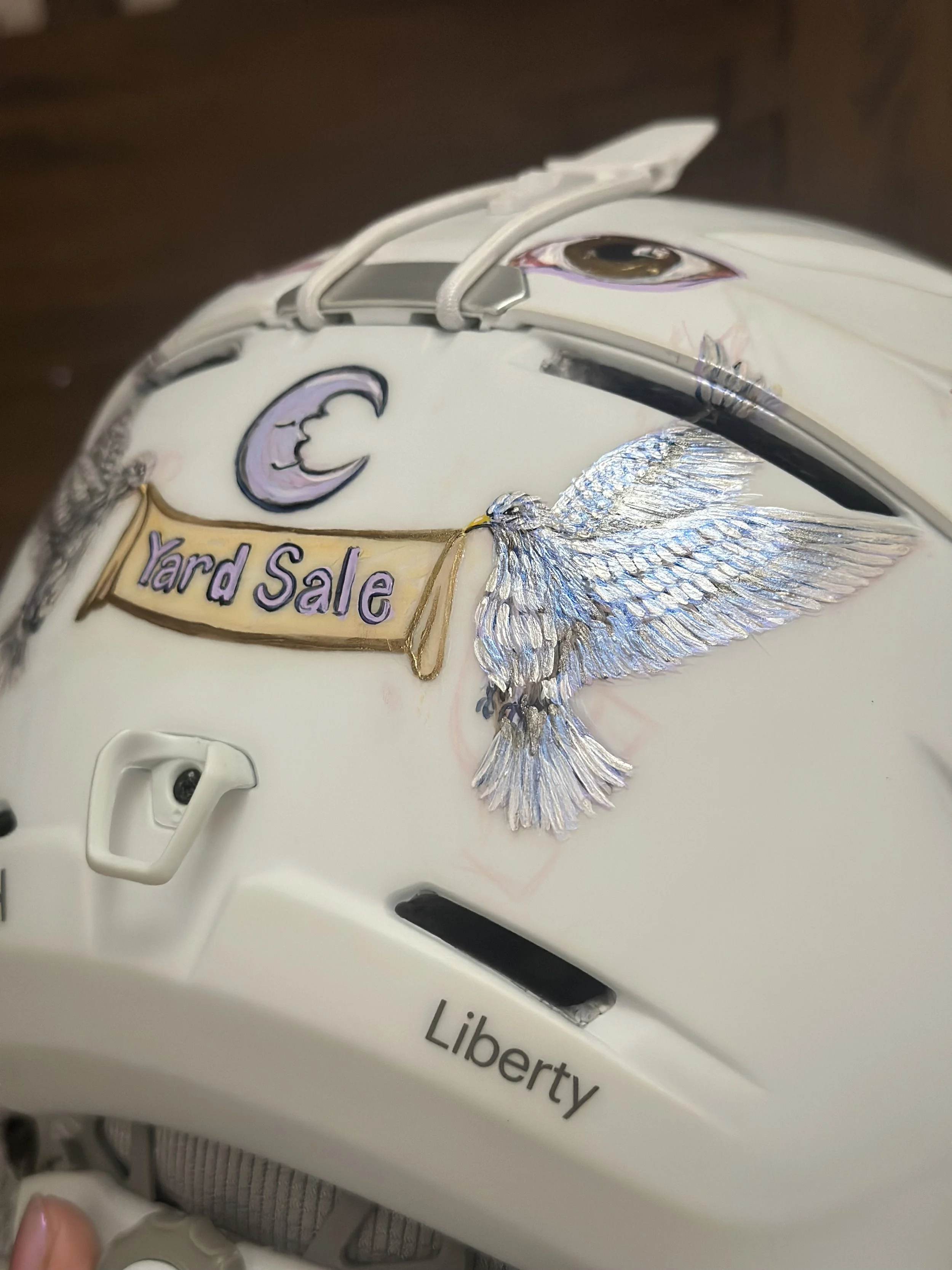 Helmet Project: Back Yard Sale Detail (2026). Acrylic on ski helmet. 