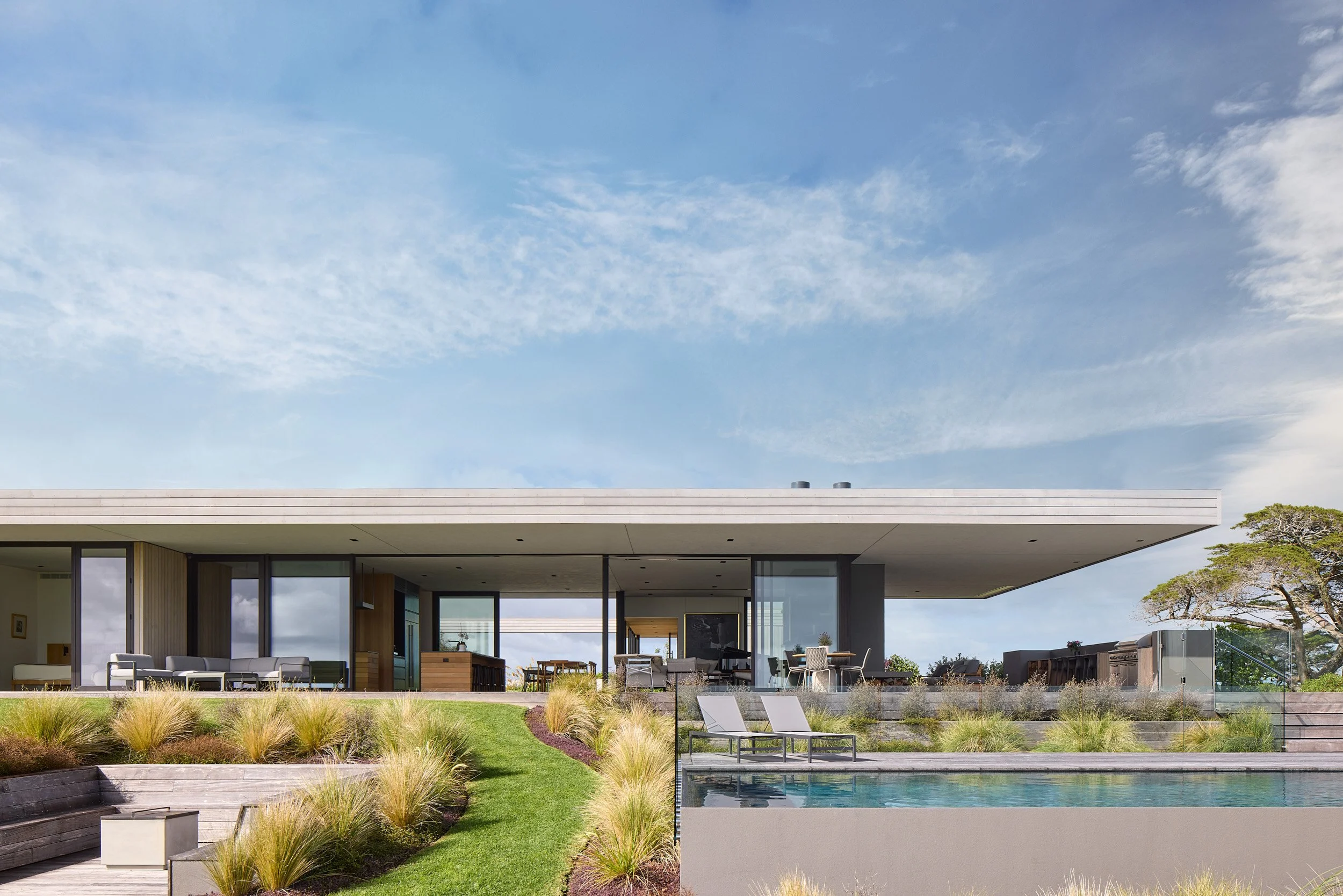 FRAMED BY PASTURE AND SEA