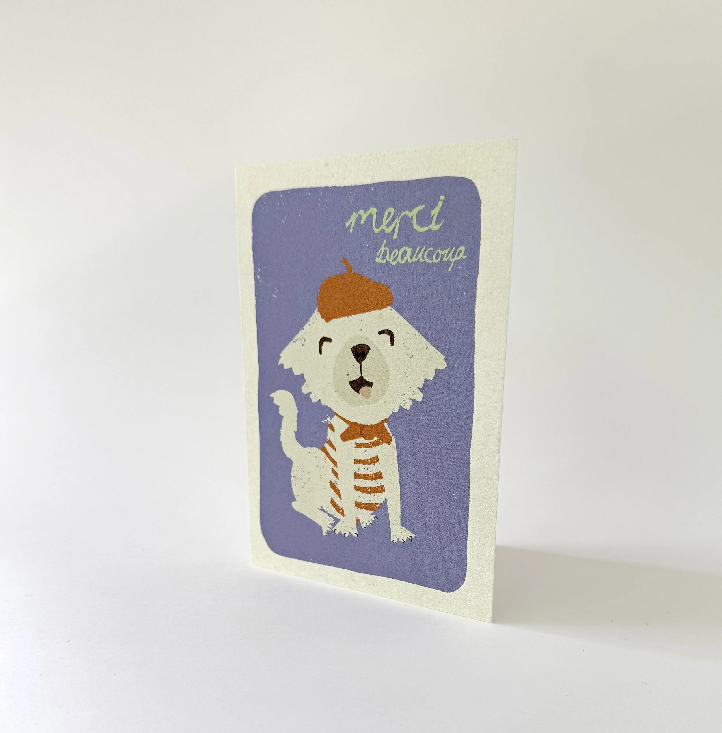 Merci Beaucoup standing.jpg