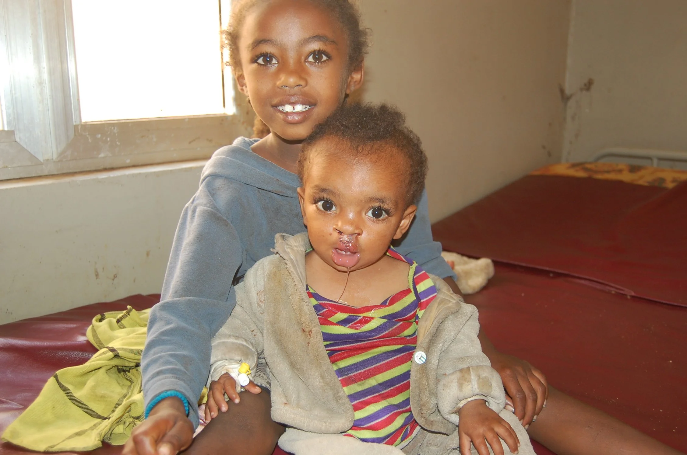 Wakjira pictured with his sister.