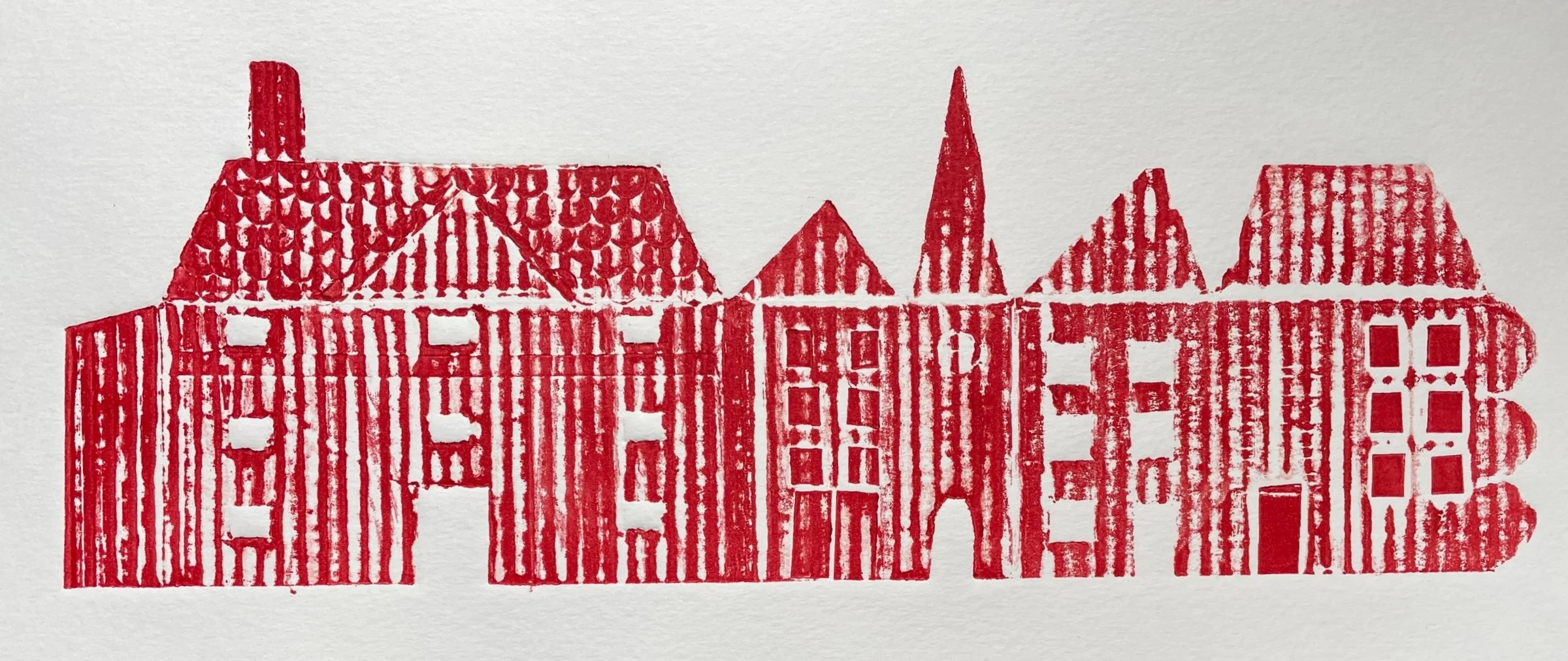 A red, stylized illustration of a row of houses with various roof shapes and windows, created with a textured, stamped appearance.