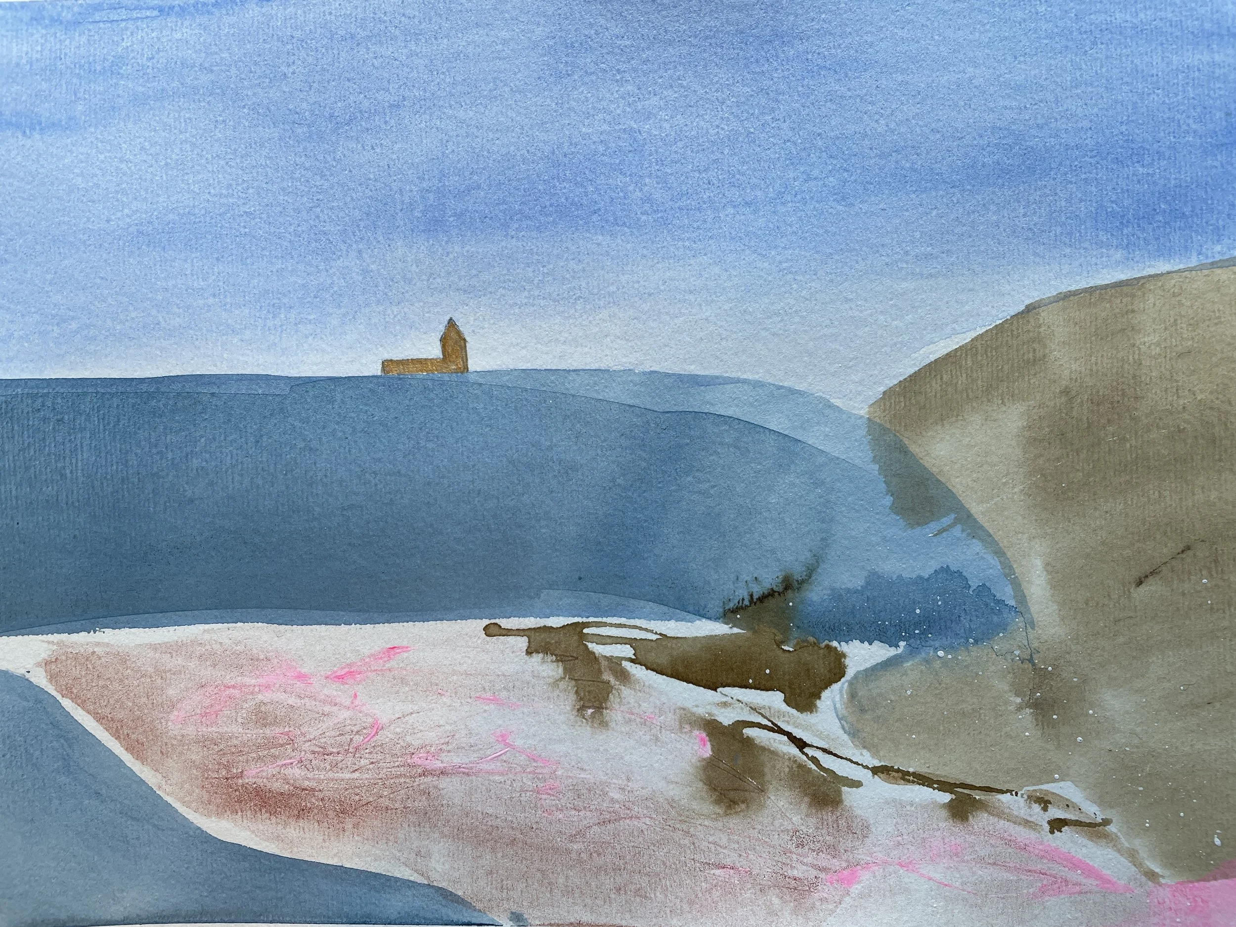 Watercolor painting of a coastal landscape with a distant small church on the hill, blue sky, blue water, sandy shore, and rocky formations.
