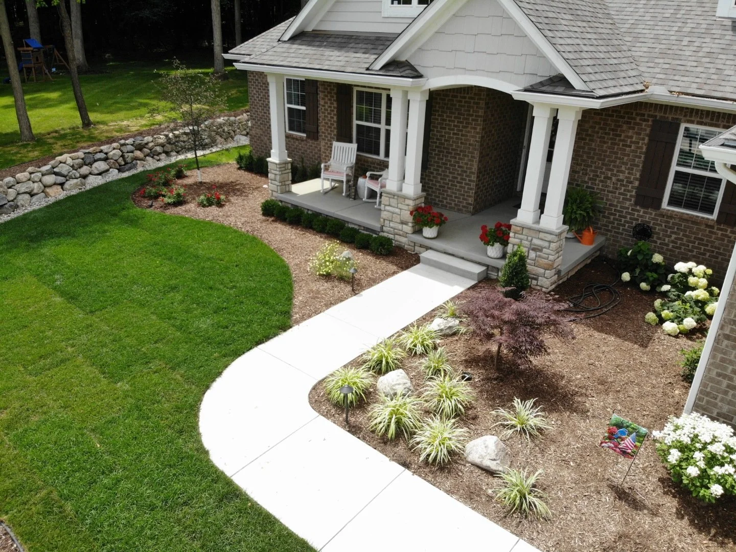 Landscape design with retaining wall in Hamburg Township, MI