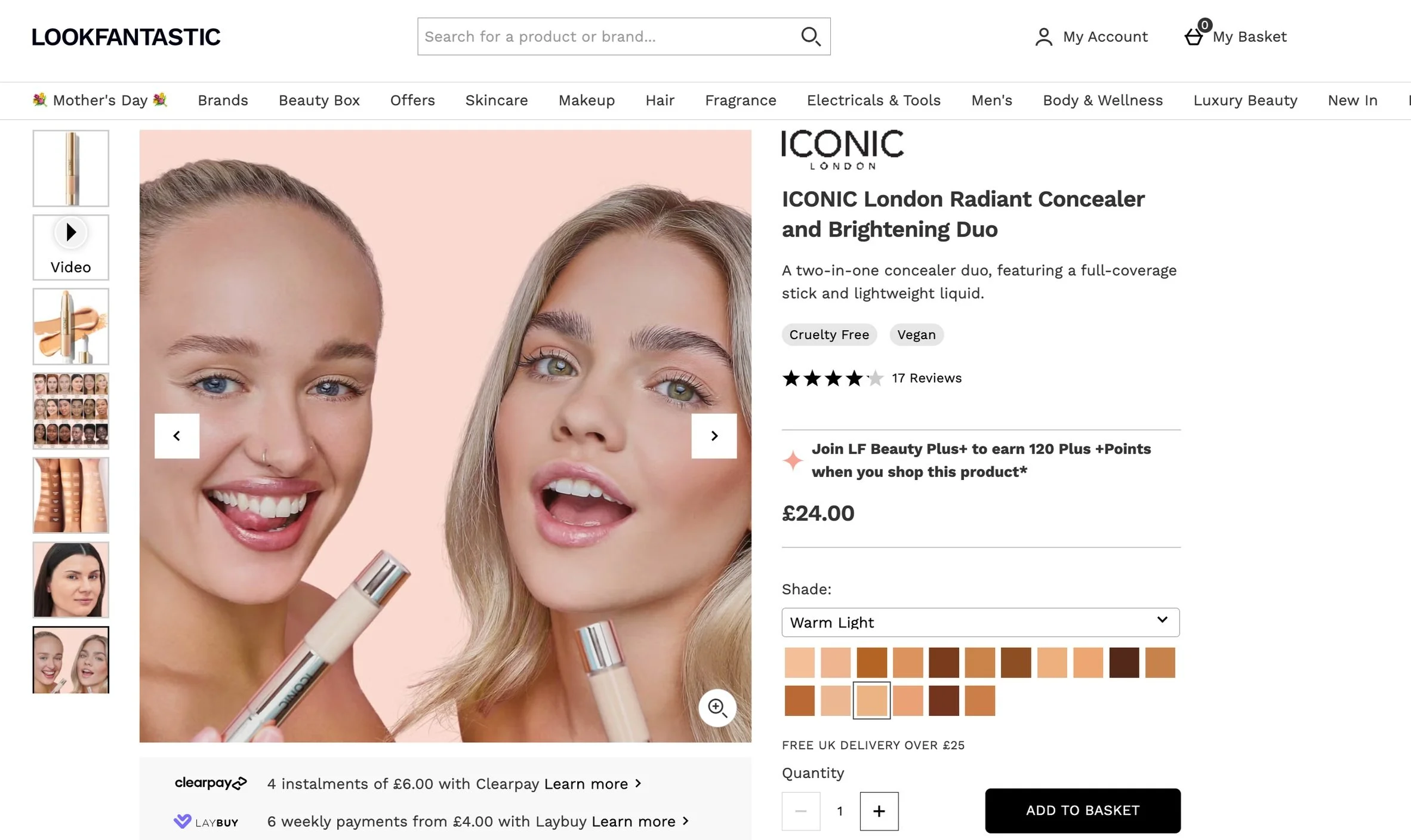 Two women holding concealer products from ICONIC London, smiling against a peach background, cosmetic products on the side, webpage layout showing product details and options for shade and quantity.