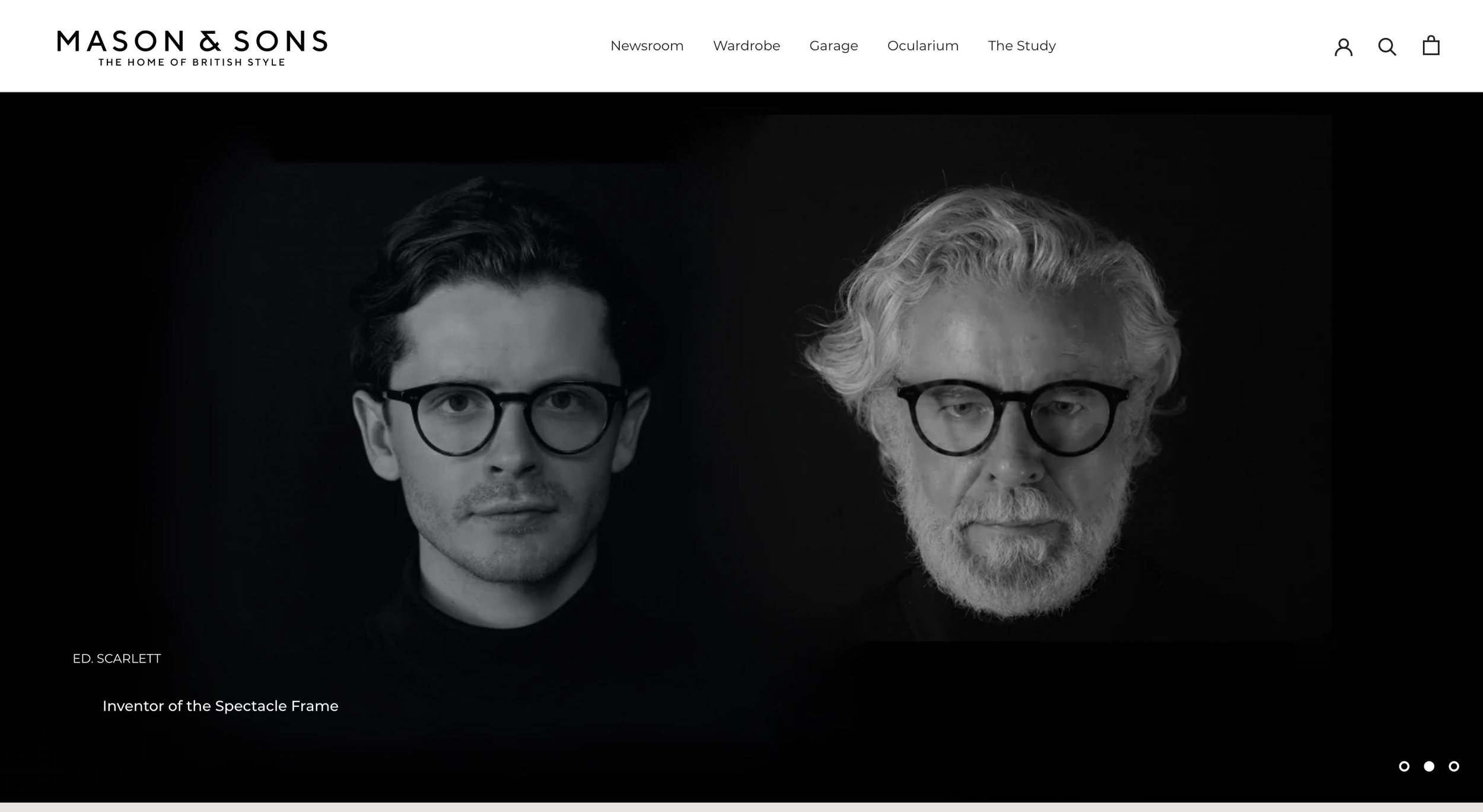 Black and white photograph of David and Elliot mason wearing glasses, one young with dark hair and one older with white hair and beard, against a black background. Caption: Ed. Scarlett, Inventor of the Spectacle Frame.