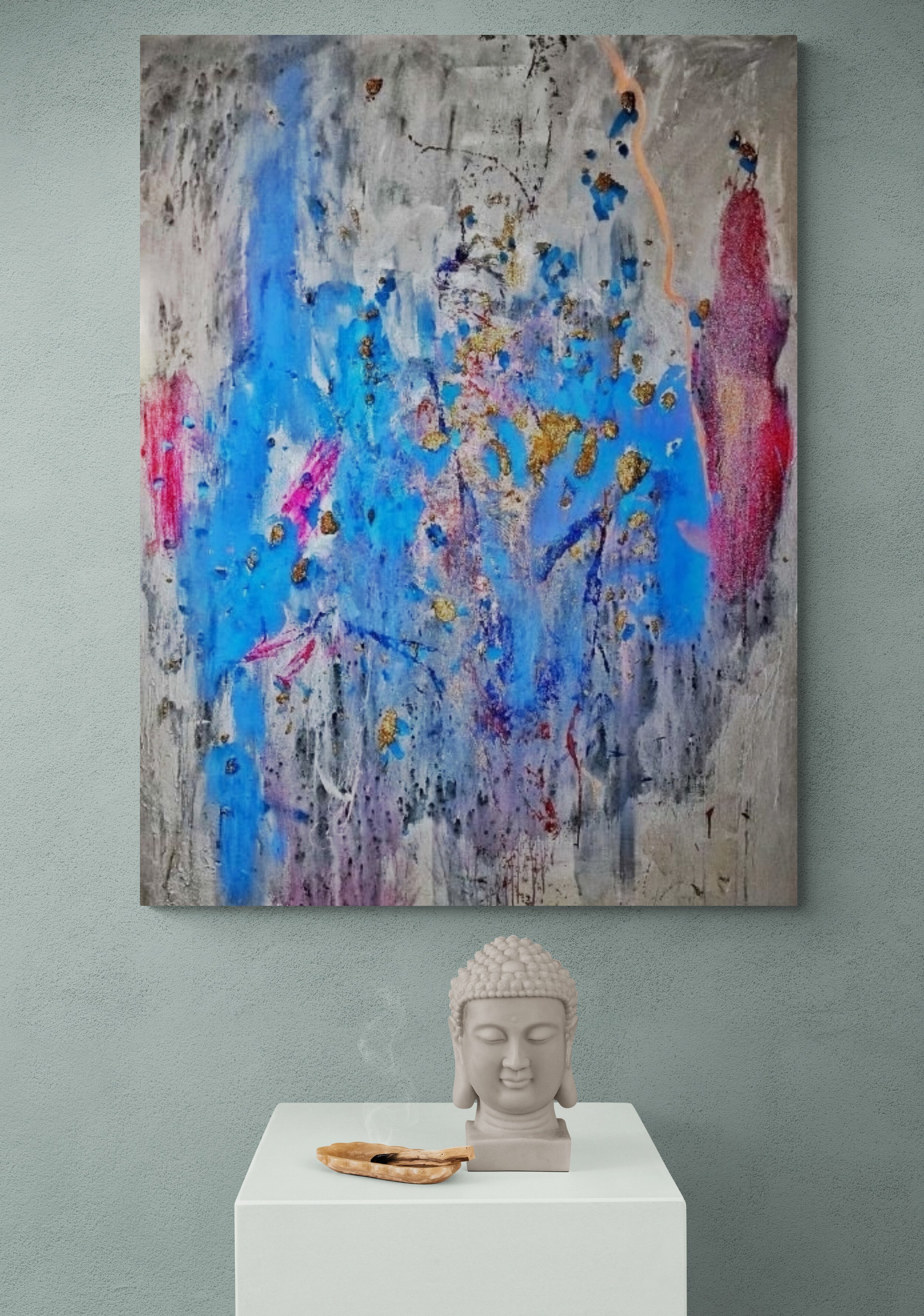 Buddha_bust_on_plinth.jpg
