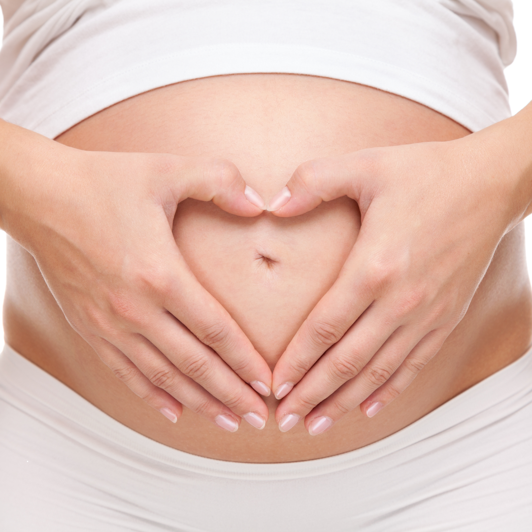 new mother holding placenta pill