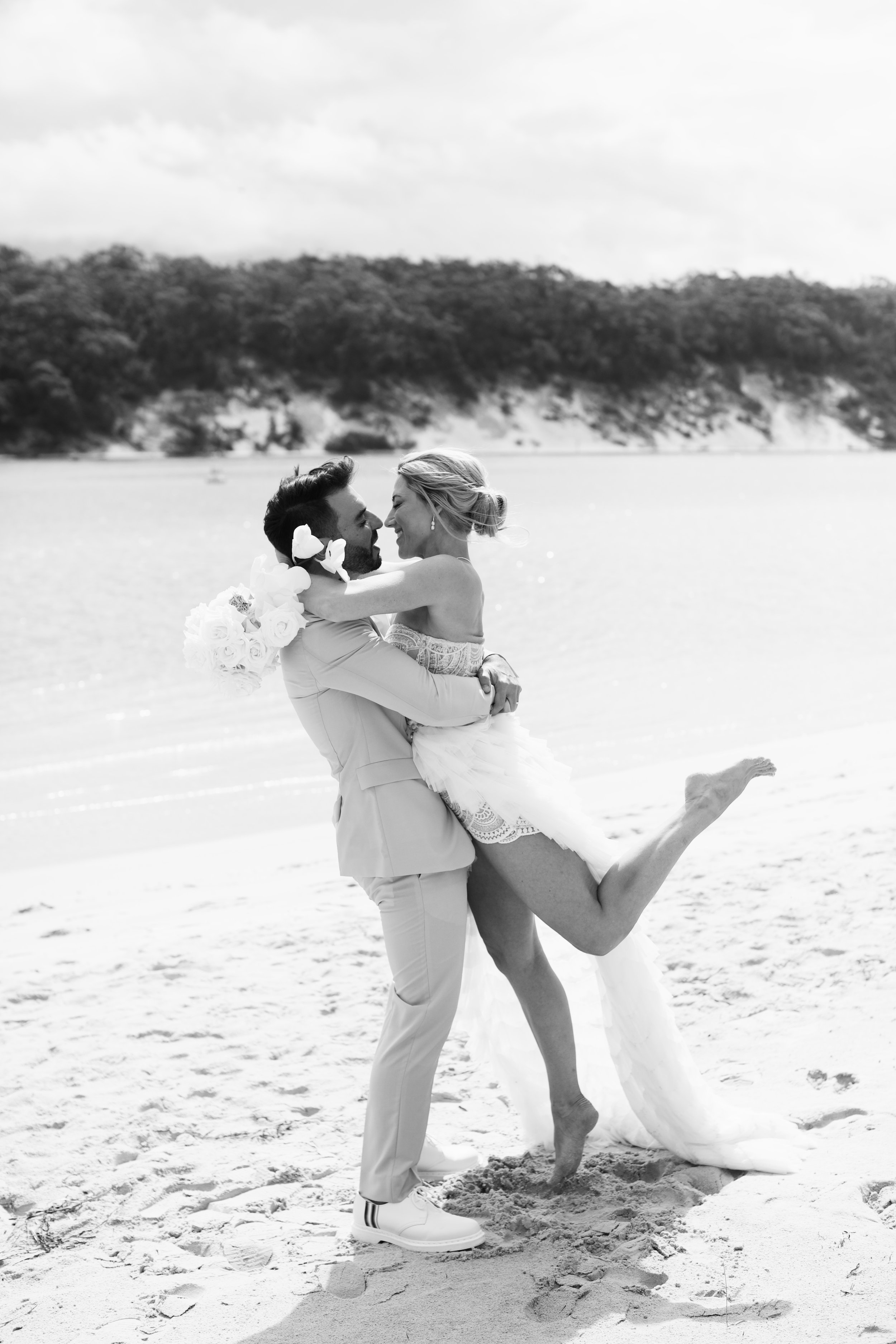  romantic candid wedding photo at the cove Jervis bay By Raquel Pires Photography the best wedding photographer Sydney australia  