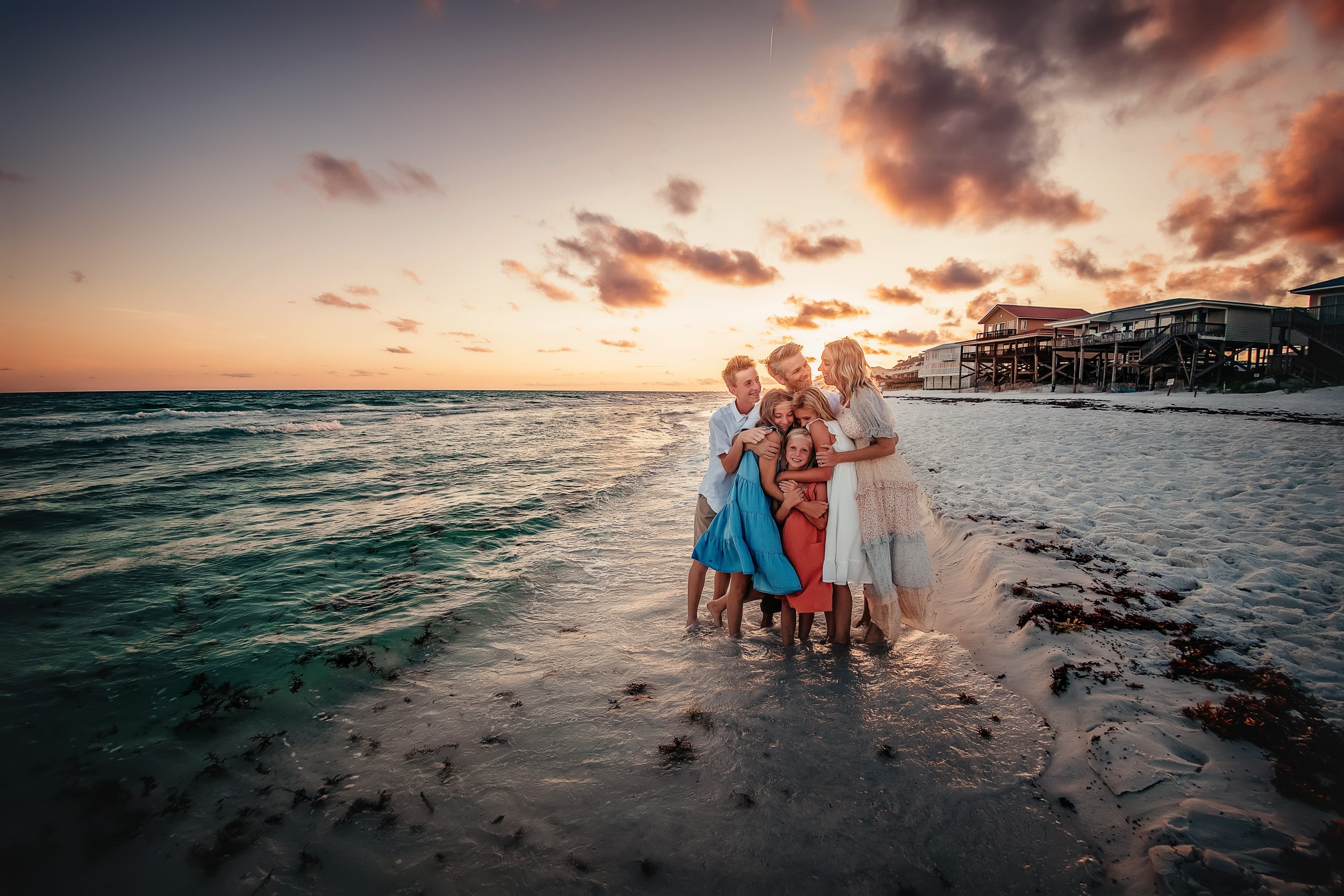 Extended family group session on the emerald coast beaches of Destin, Florida.