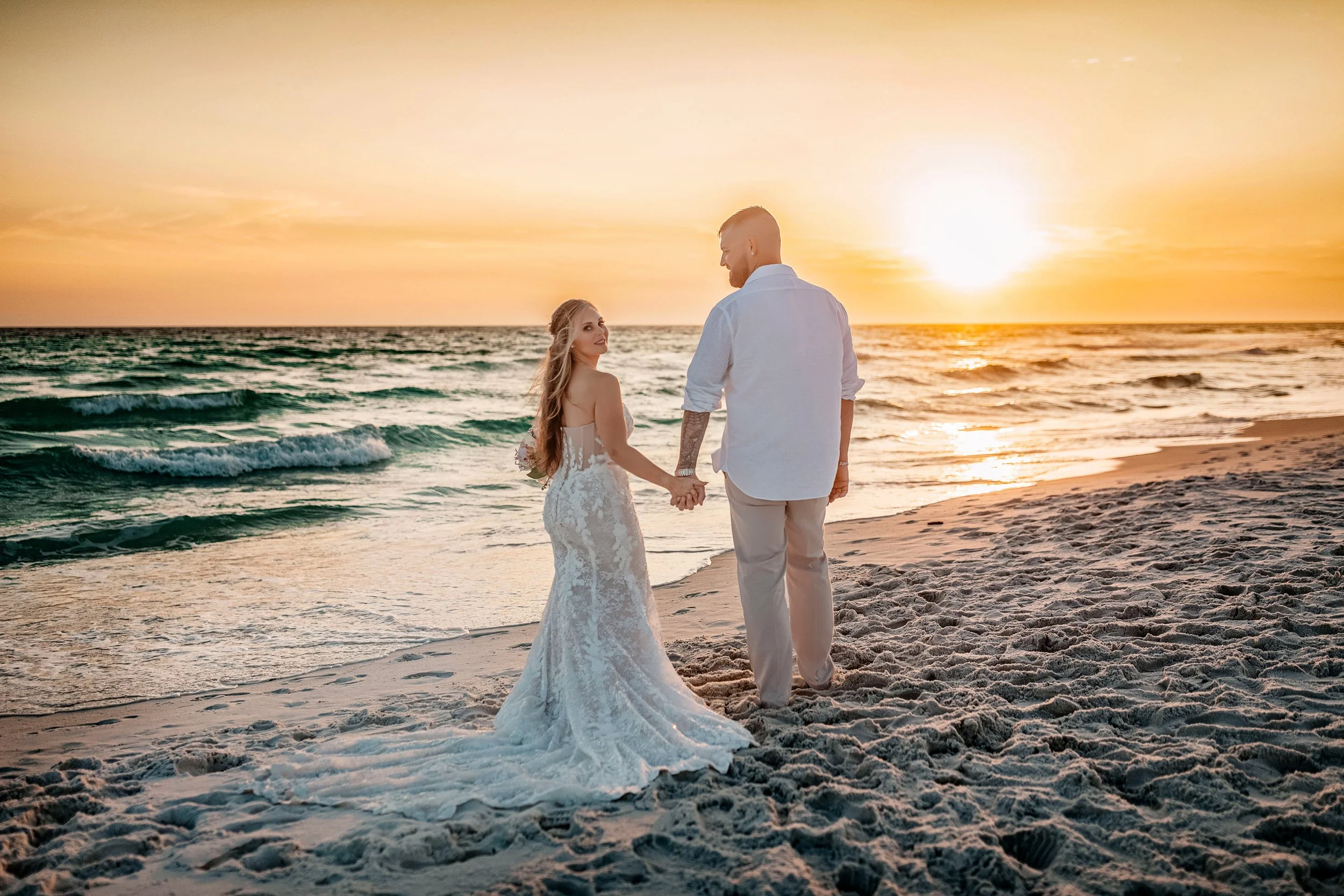 An IntimateAn Intimate Crystal Beach Ceremony. Lisa and Brody exchanged vows on the sand with 30–40 of their closest family and friends, keeping the ceremony heartfelt and personal.
