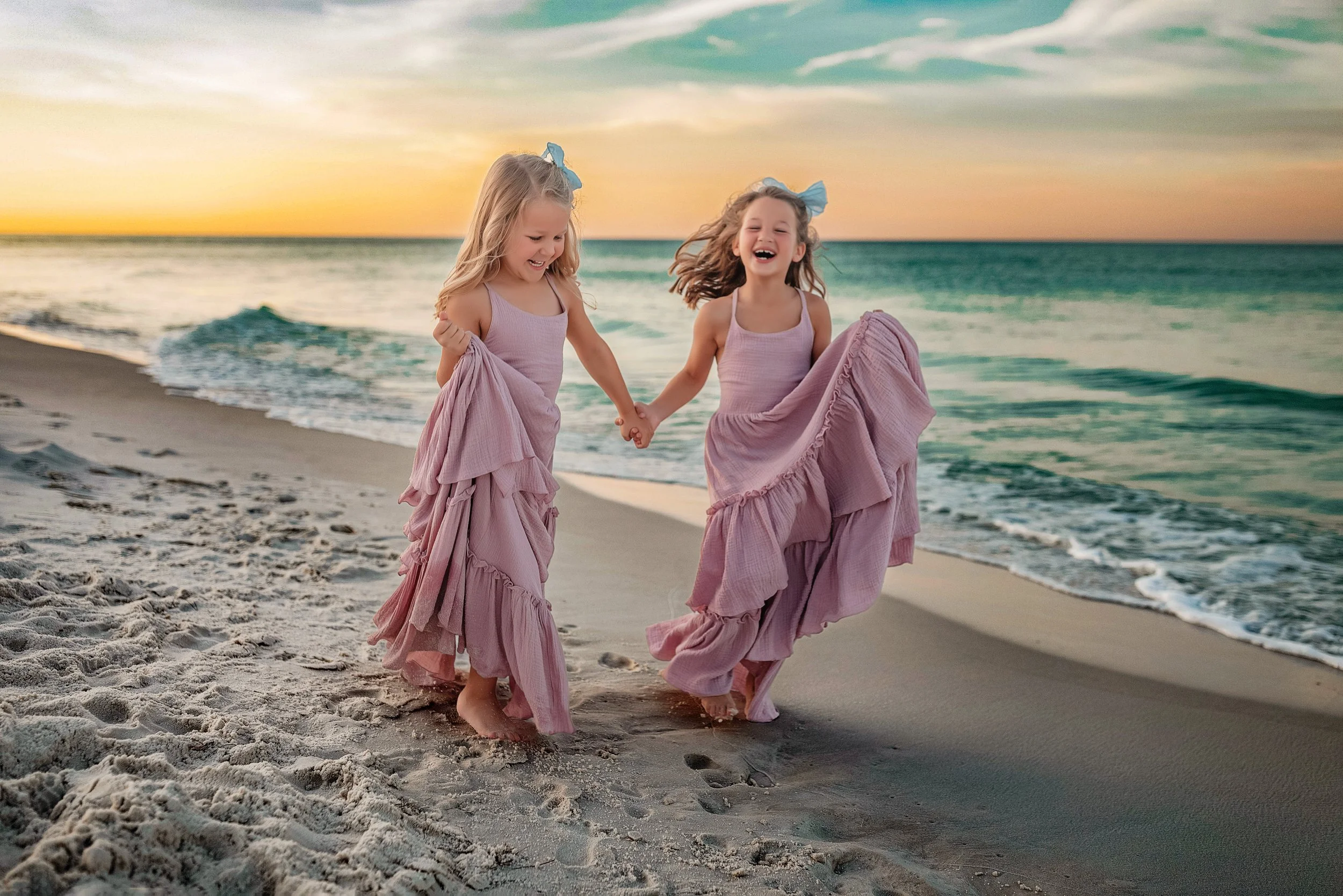 Family beach session at sunrise in Destin