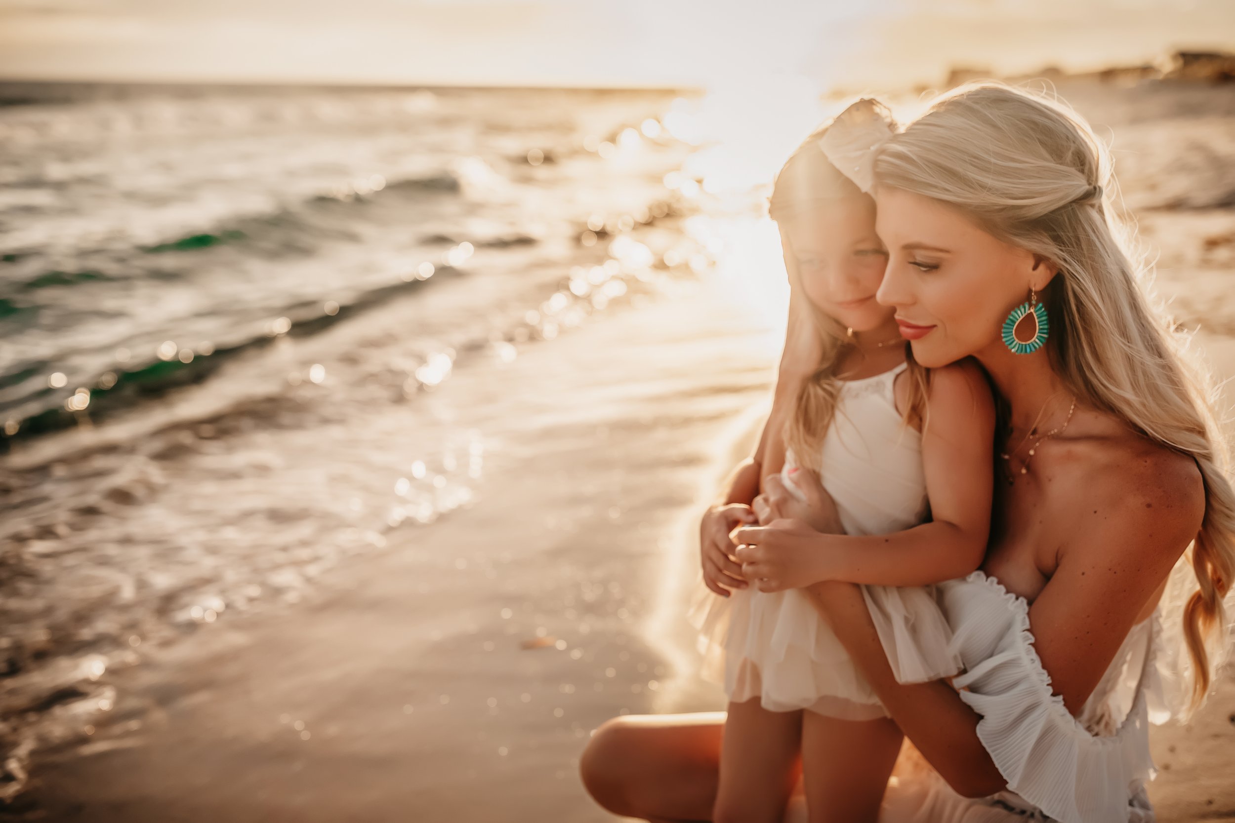 Mom holding baby during 30A beach photo session Santa Rosa Beach Florida