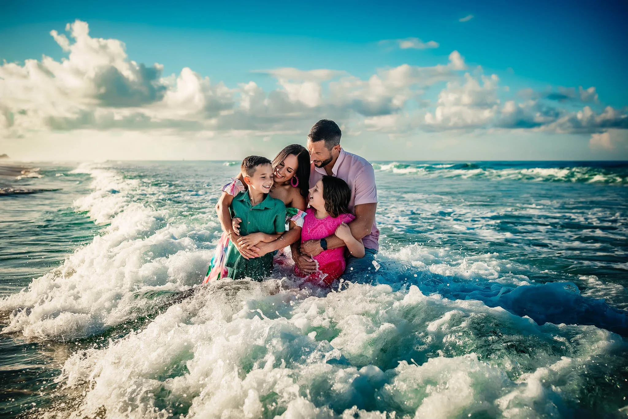 30A Beach Session-A family embracing enjoy their beach session