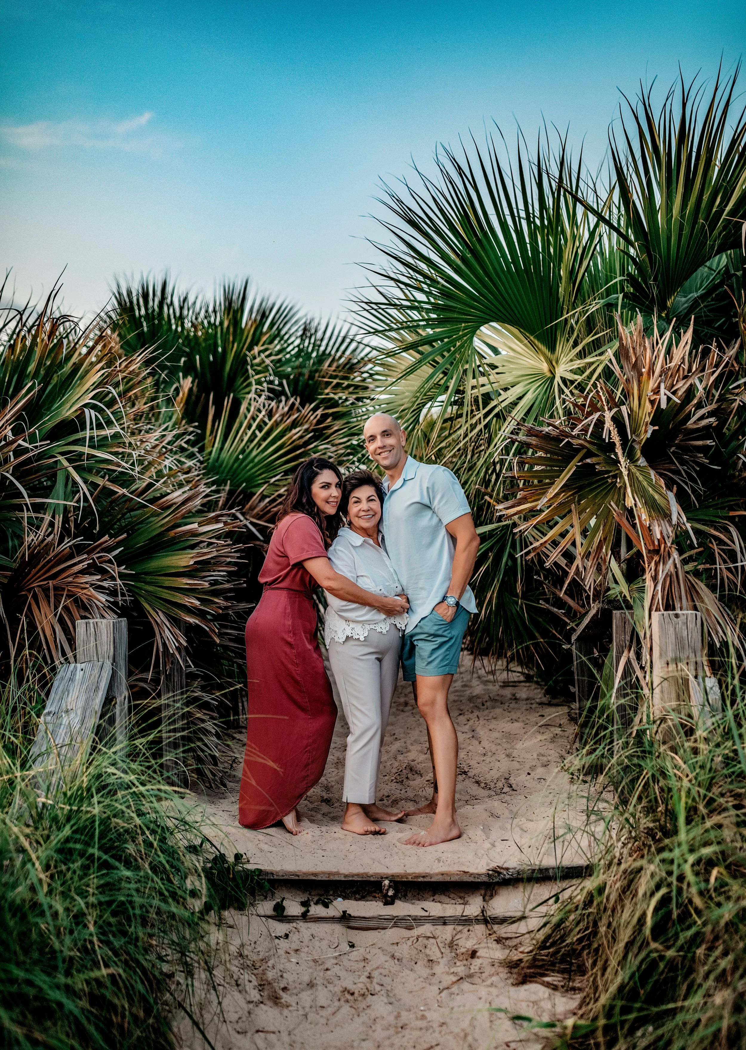 Mother, Daughter, Son on the  sandy dune path during an Inlet Beach family photography session on 30A