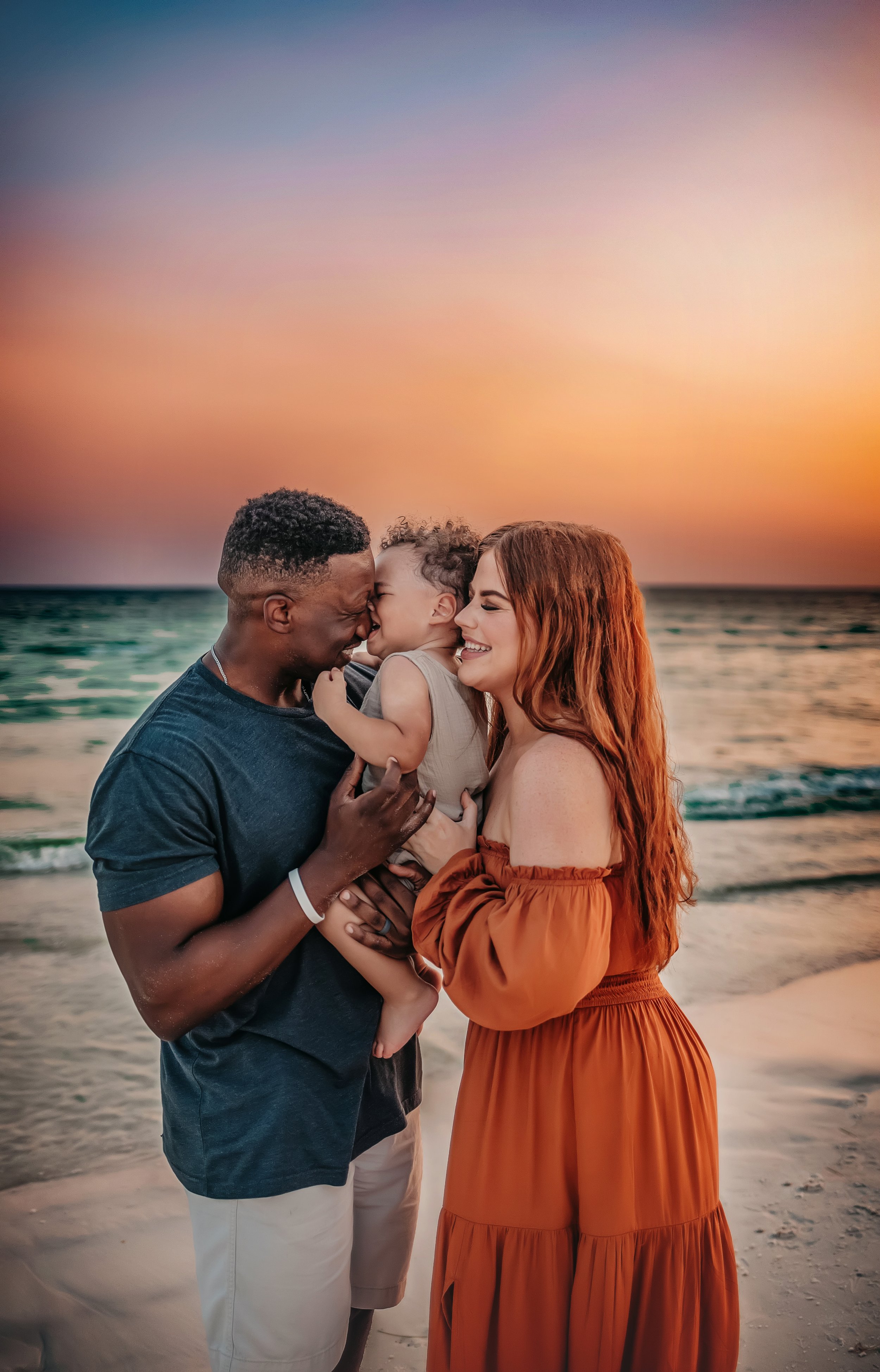 Intimate family portrait at sunset on 30A, captured by a Rosemary Beach family photographer known for emotional, connection-focused beach photography.