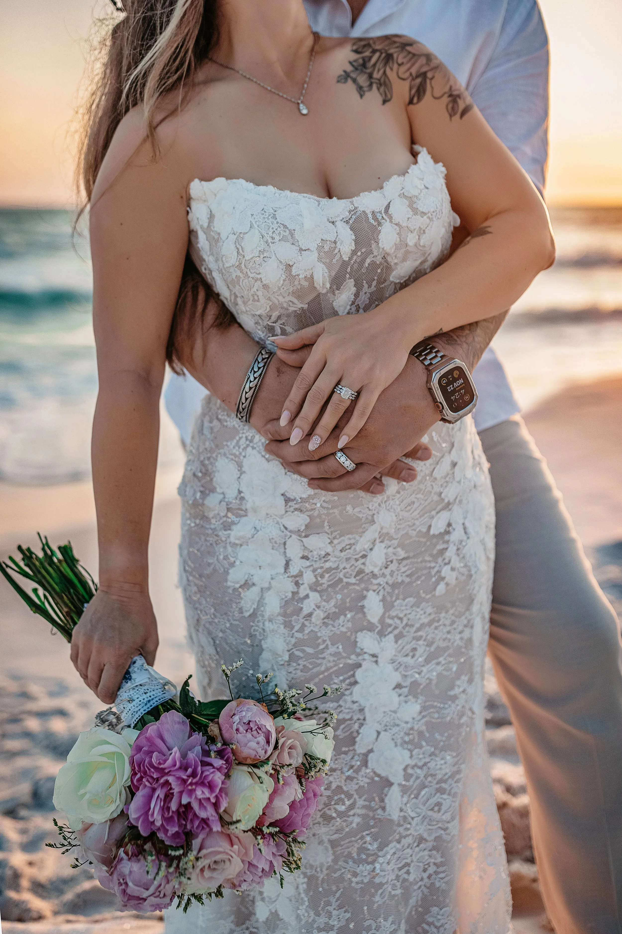 An IntimateAn Intimate Crystal Beach Ceremony. Lisa and Brody exchanged vows on the sand with 30–40 of their closest family and friends, keeping the ceremony heartfelt and personal.