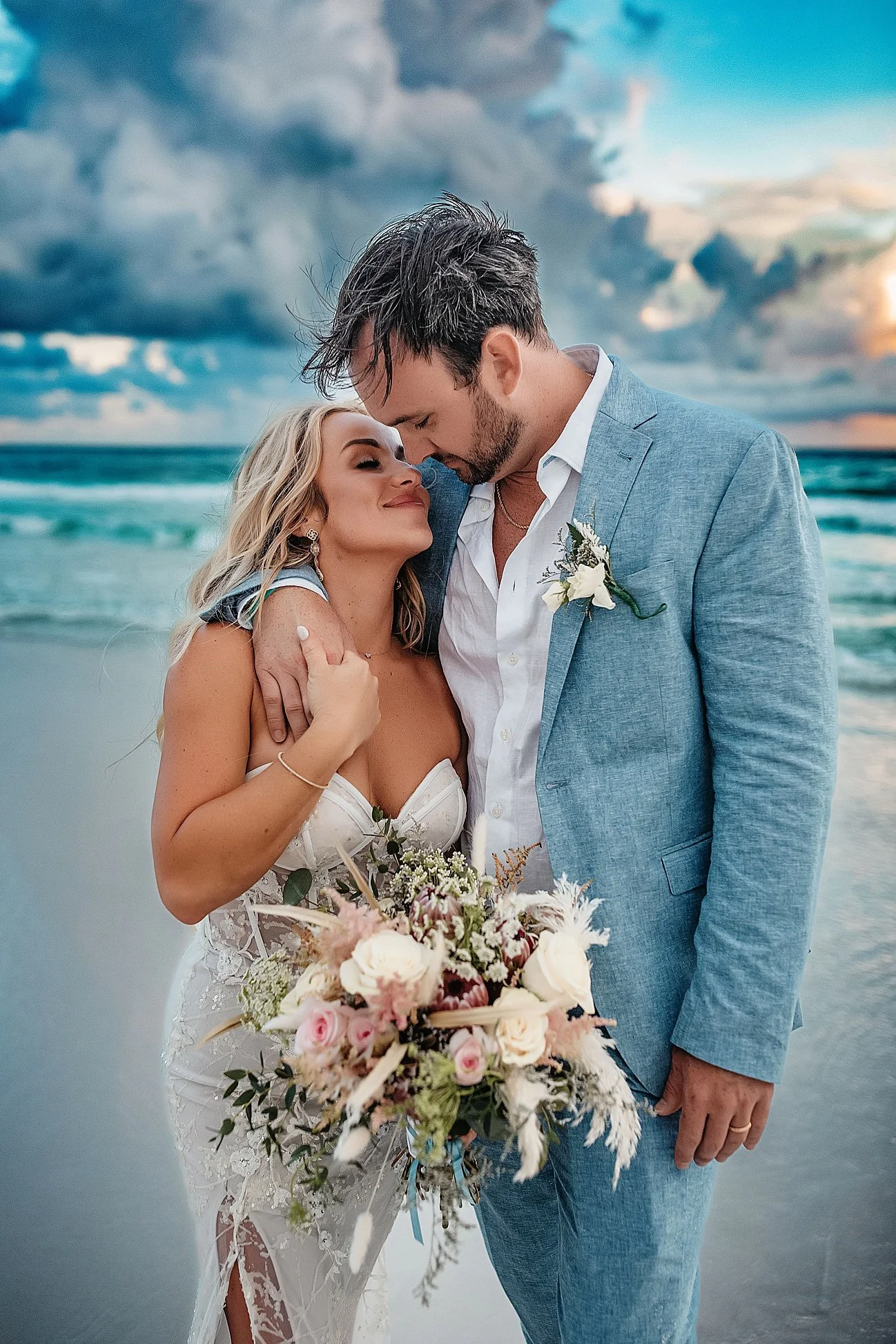A luxury wedding portrait in Seaside, FL, featuring a bride and groom in a documentary-inspired, emotional storytelling style.