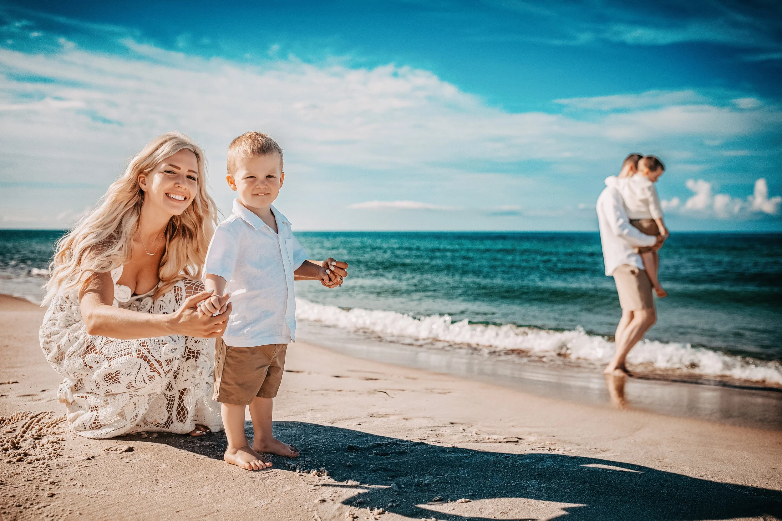 Coastal lifestyle family session on 30A captured during sunset with candid movement, barefoot kids, and warm coastal tones, ideal for families vacationing in WaterColor or Rosemary Beach.