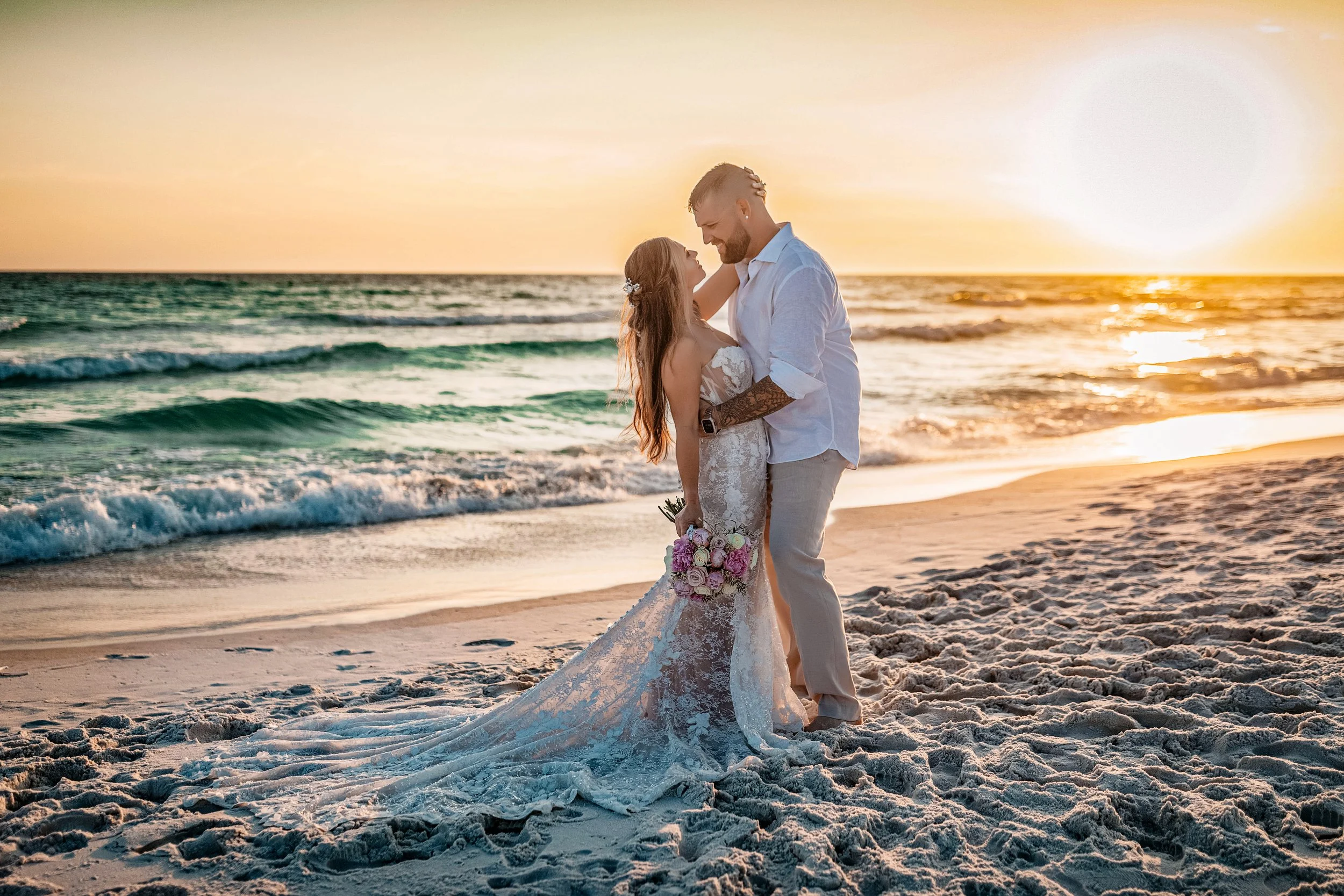 An IntimateAn Intimate Crystal Beach Ceremony. Lisa and Brody exchanged vows on the sand with 30–40 of their closest family and friends, keeping the ceremony heartfelt and personal.