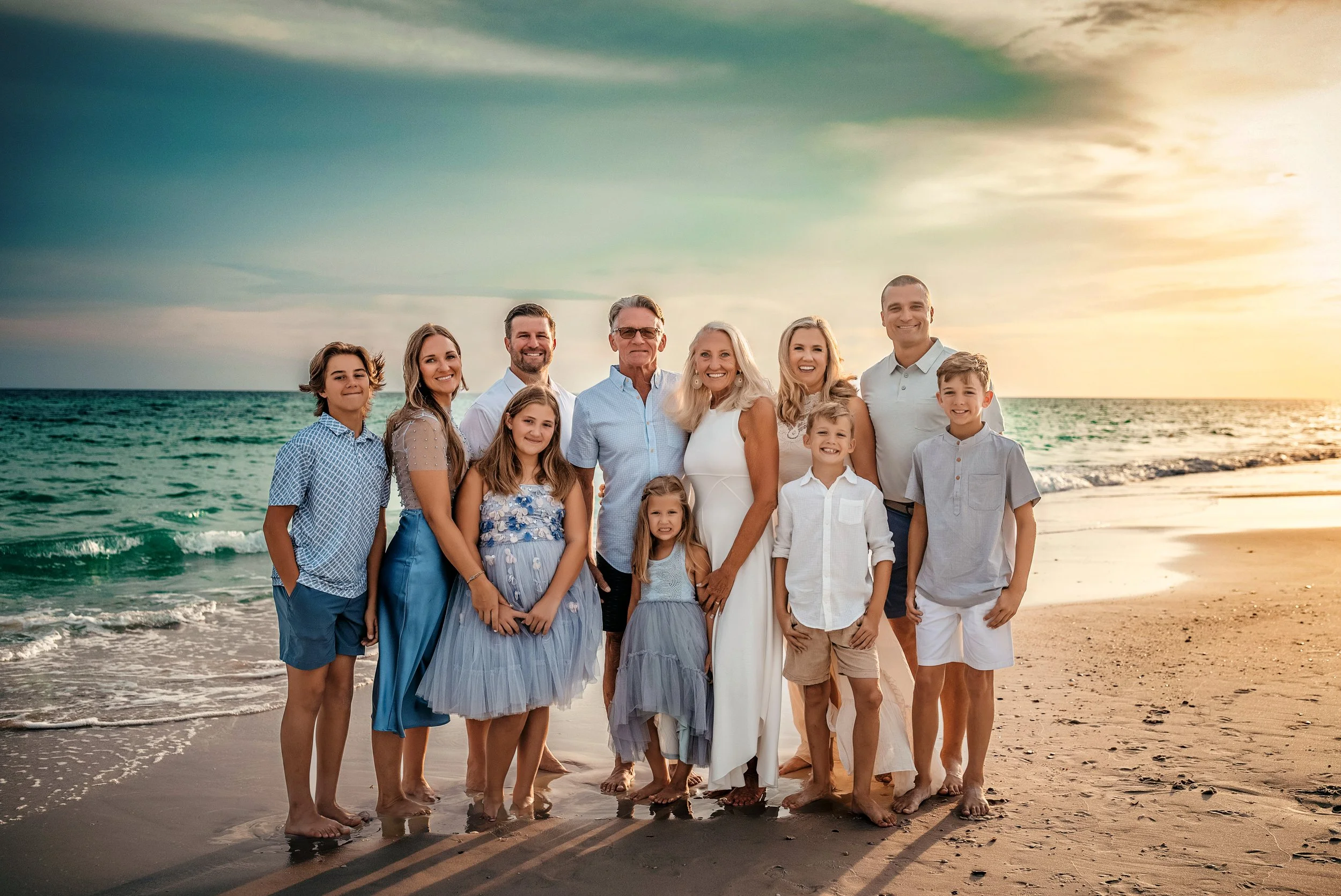 Extended family session on 30A with coordinated neutrals, barefoot posing, and warm sunset editorial tones. Frequently booked for multigenerational vacations and reunion trips in WaterSound, Seaside, and Rosemary Beach.
