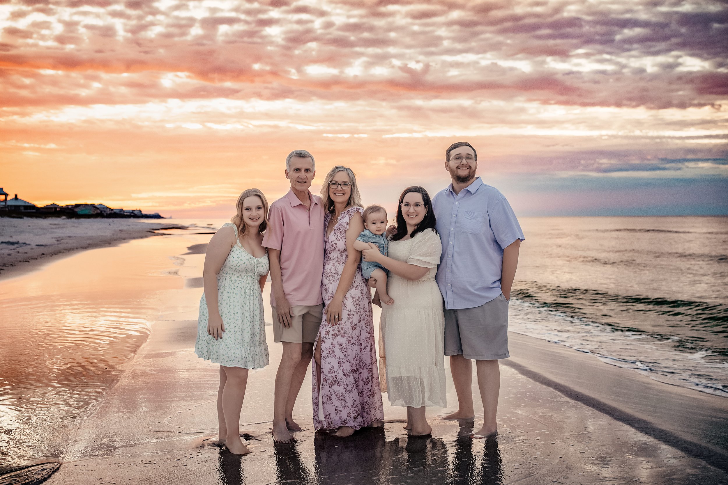 Extended family gathering on the beach in Inlet Beach for a legacy portrait session during a summer vacation