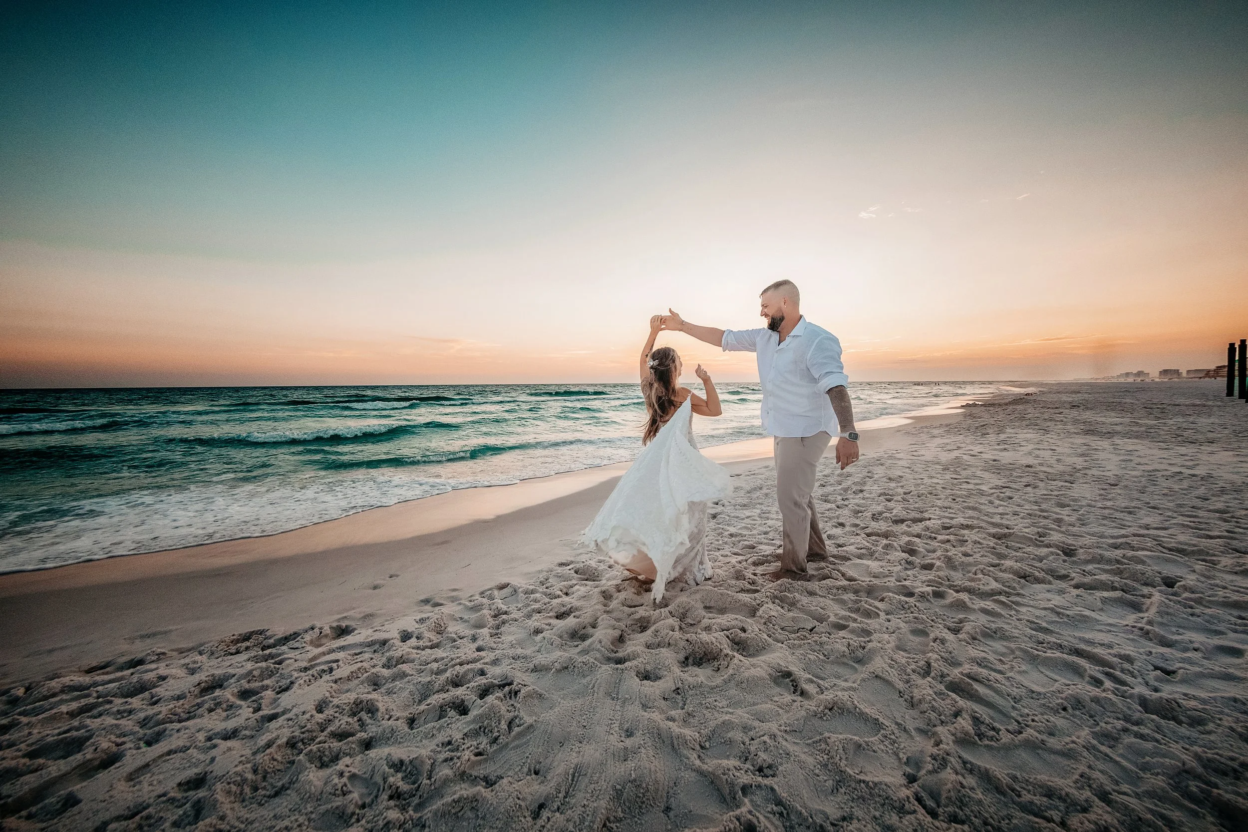 An IntimateAn Intimate Crystal Beach Ceremony. Lisa and Brody exchanged vows on the sand with 30–40 of their closest family and friends, keeping the ceremony heartfelt and personal.