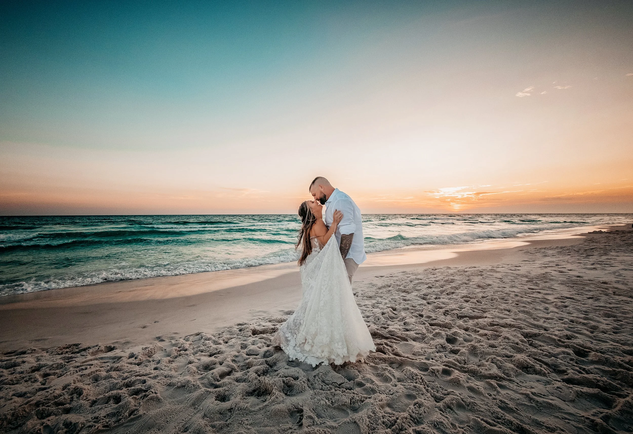 An IntimateAn Intimate Crystal Beach Ceremony. Lisa and Brody exchanged vows on the sand with 30–40 of their closest family and friends, keeping the ceremony heartfelt and personal.