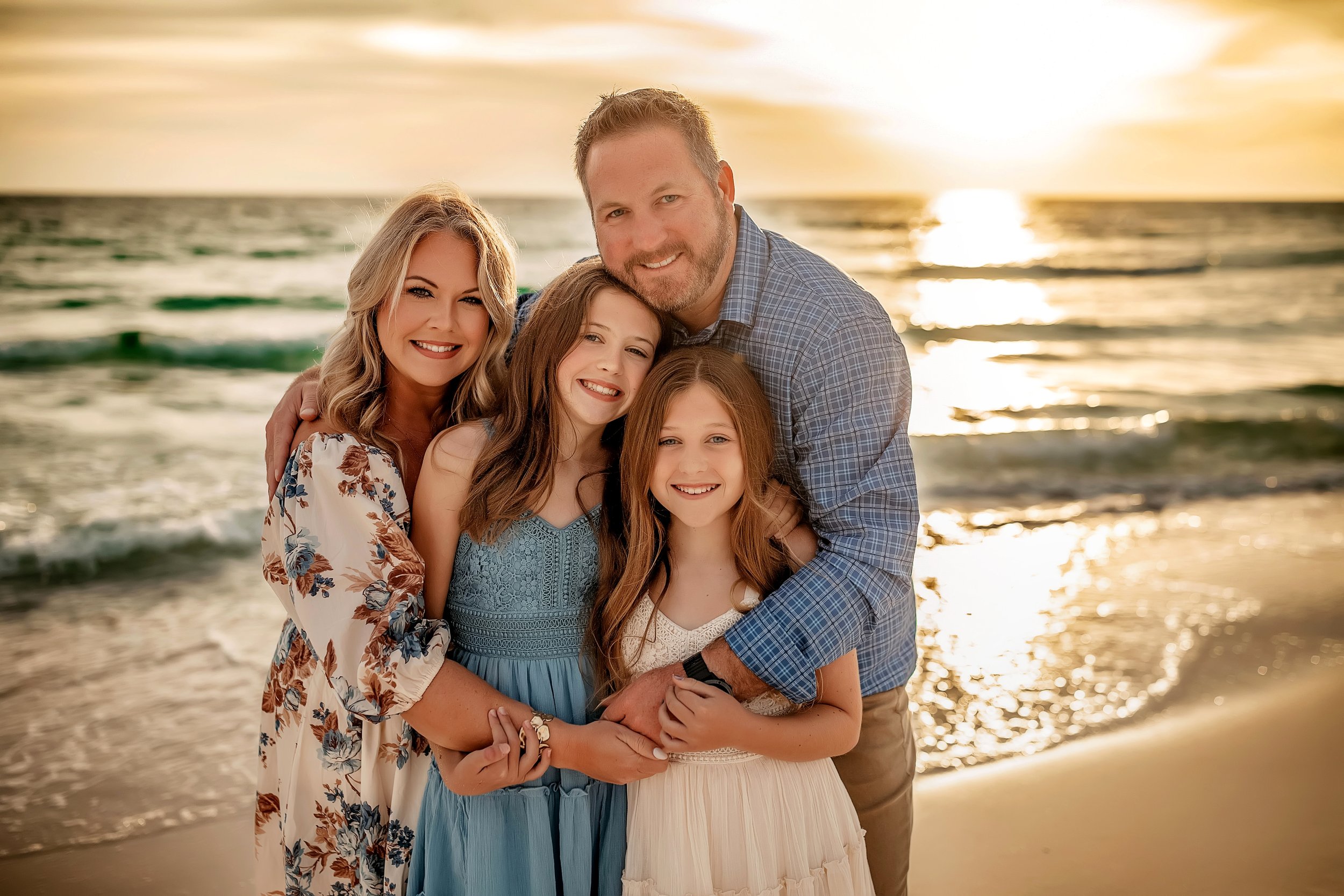 Family of four at Rosemary Beach at golden hour — floral wrap maxi, blue plaid, dusty blue and white lace — 30A family beach photographer