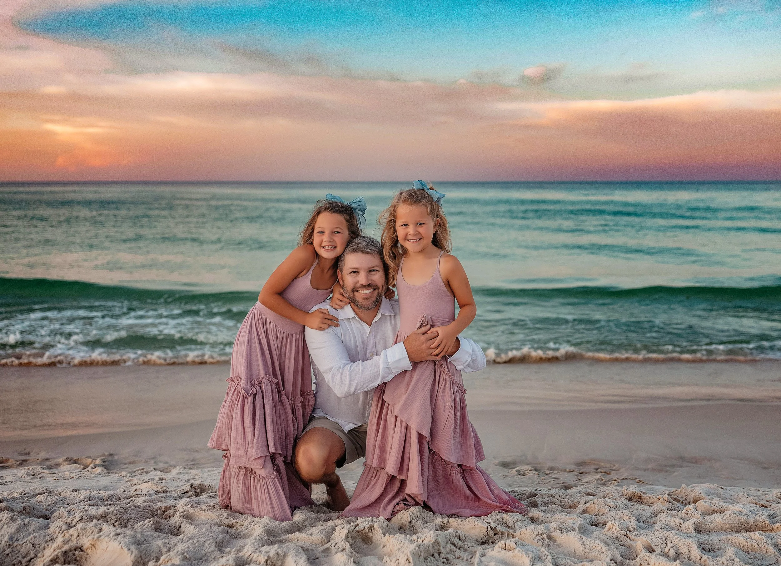 Natural family photography on the Emerald Coast at sunrise