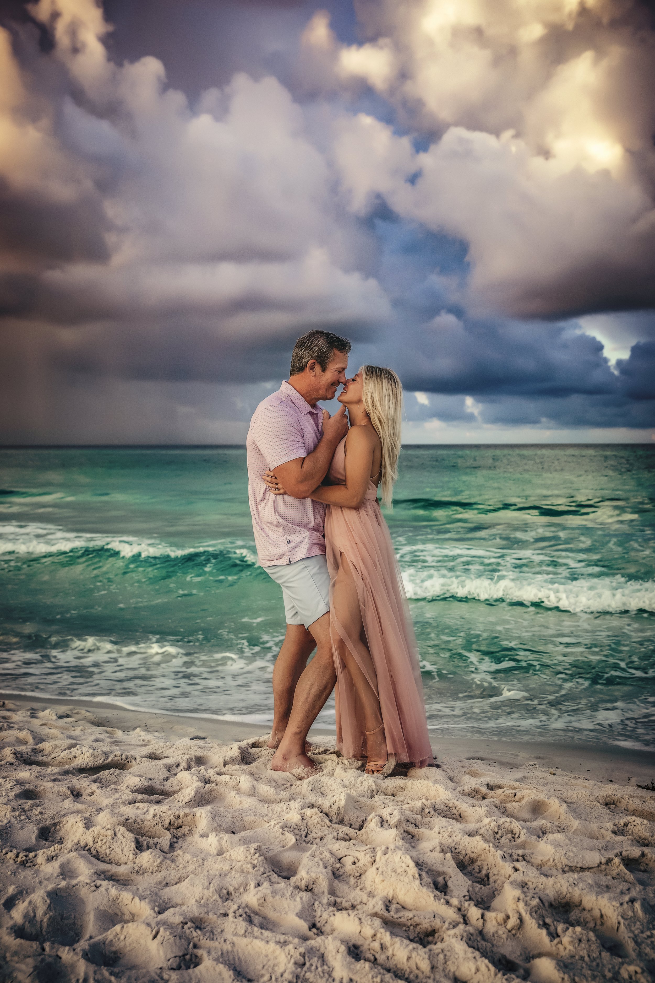 Engagement session with a couple on the beaches of Rosemary Beach during sunrise.