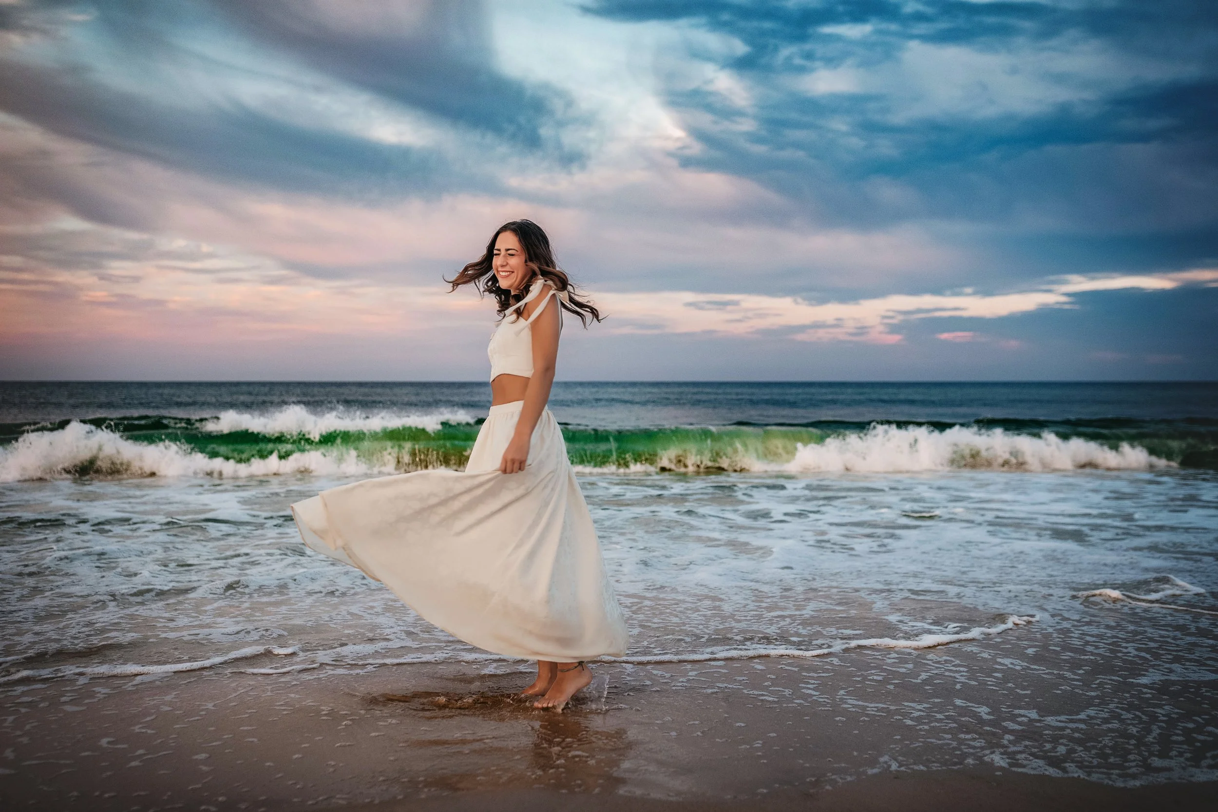Senior twirling on the beaches of Panama City Beach