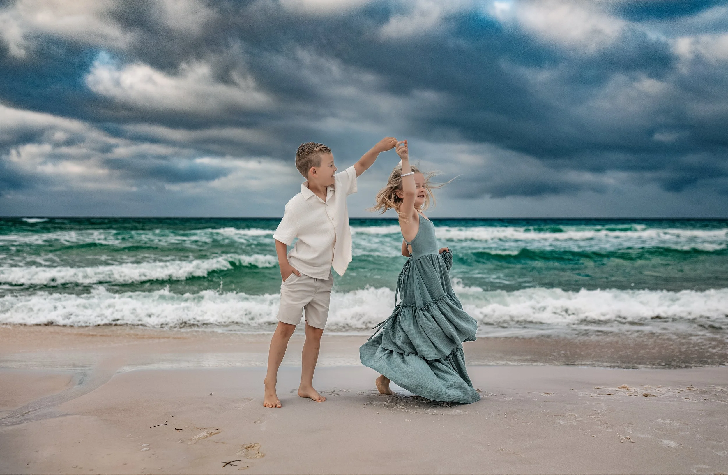 Kids playing near the waves on 30A beach in coordinated outfits — family session Inlet Beach Florida photographer