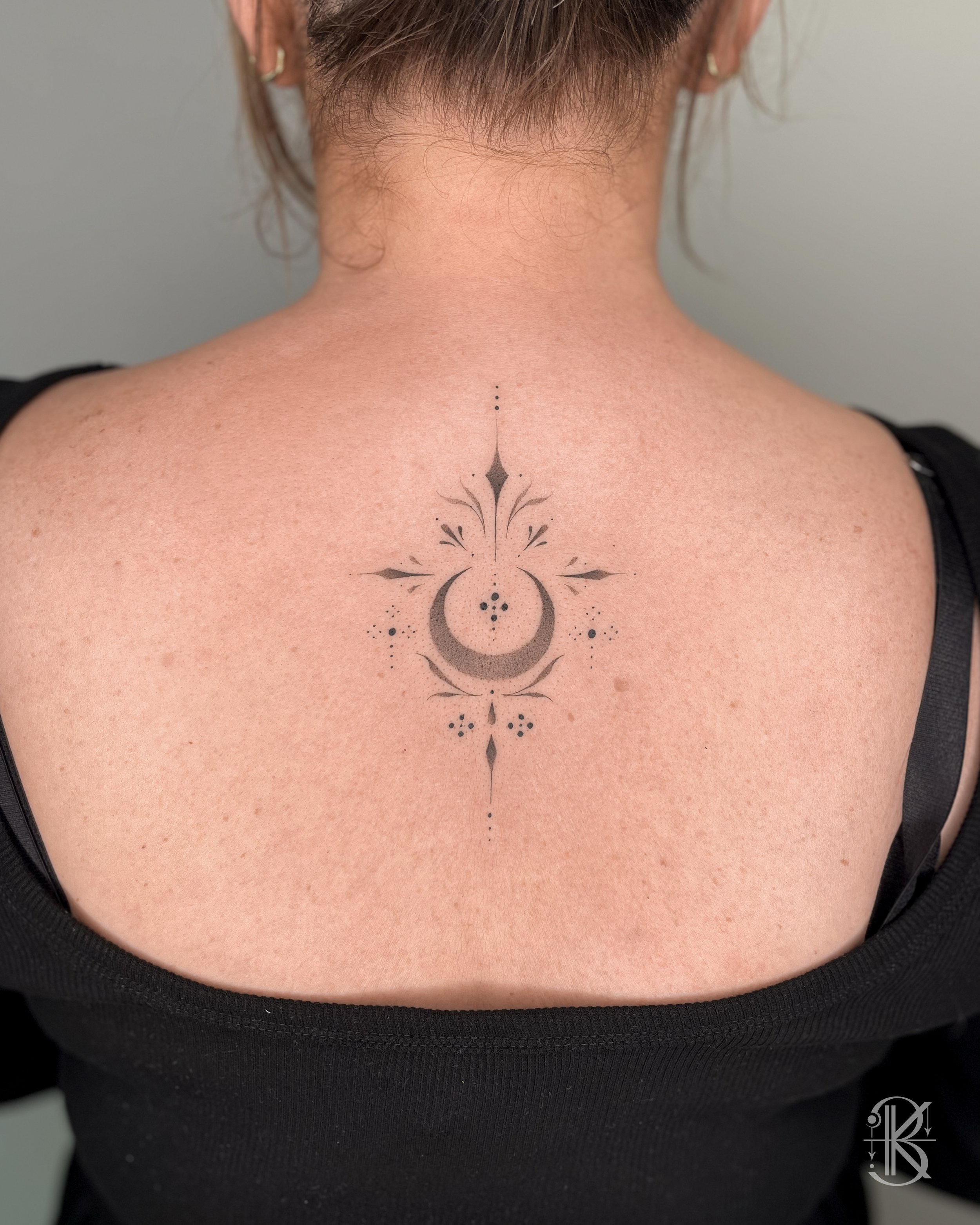 Ornamental moon back tattoo by Karen Byers Ink, ornamental and black & grey tattoo artist based in Birmingham, UK – Featuring intricate botanical elements & smooth stipple shading.