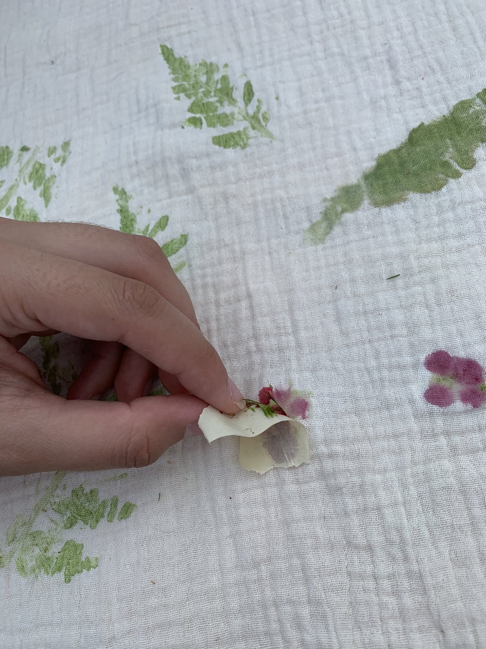 Using tape, peel off any flower residue