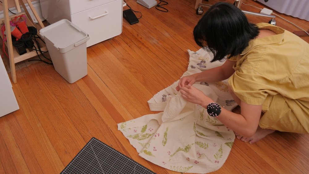 Gathering the skirt, pinning between waistband