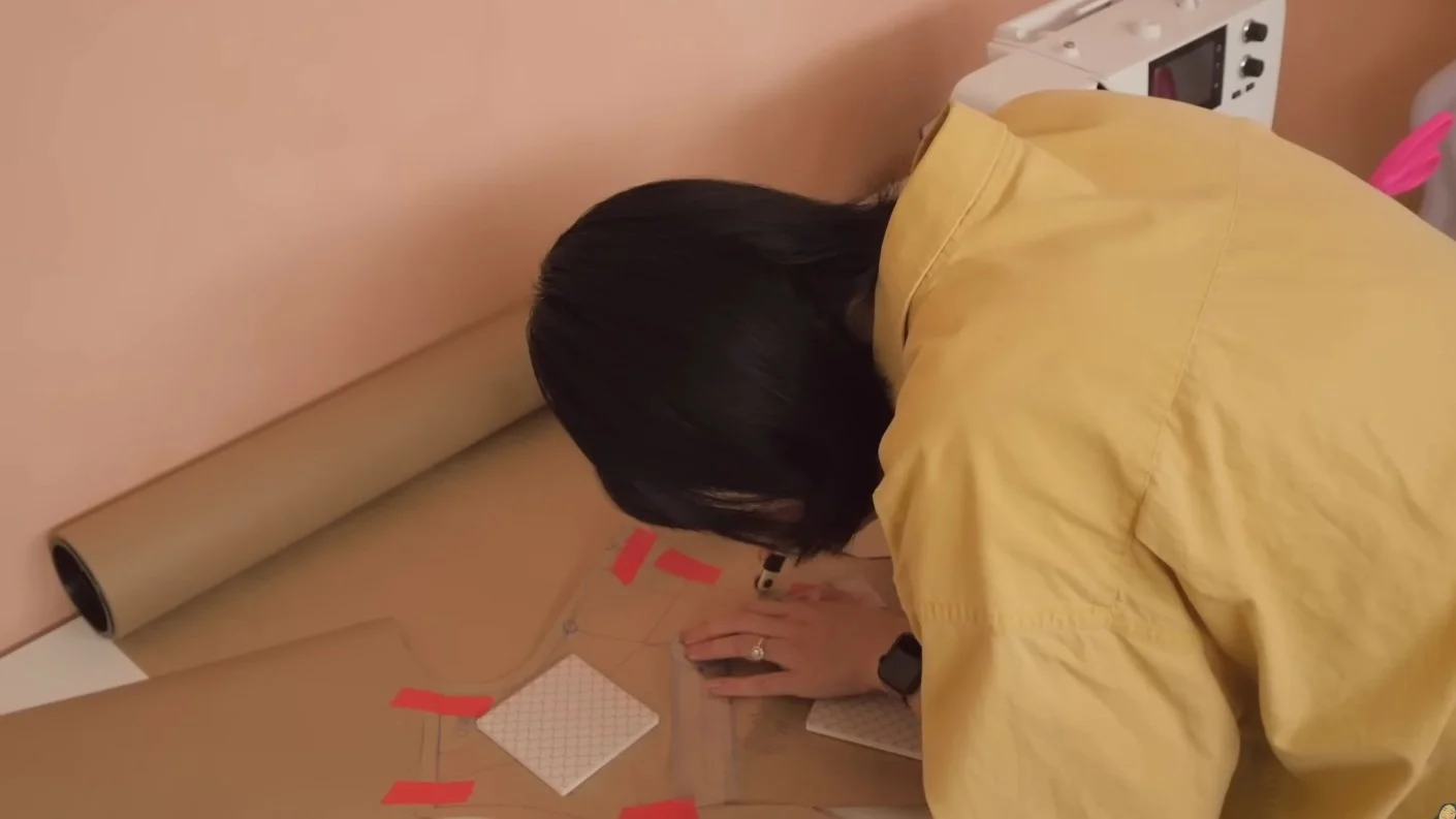 Using a tracing wheel to mark out pattern