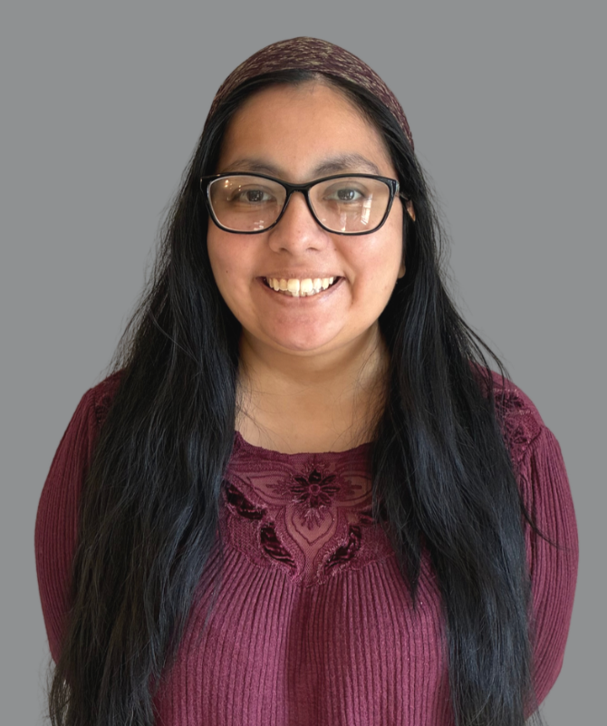 Fabiola Navichoque, Bilingual Legal Coordinator, ready to greet new clients of Path to Hope for low cost legal assistance for immigrants.