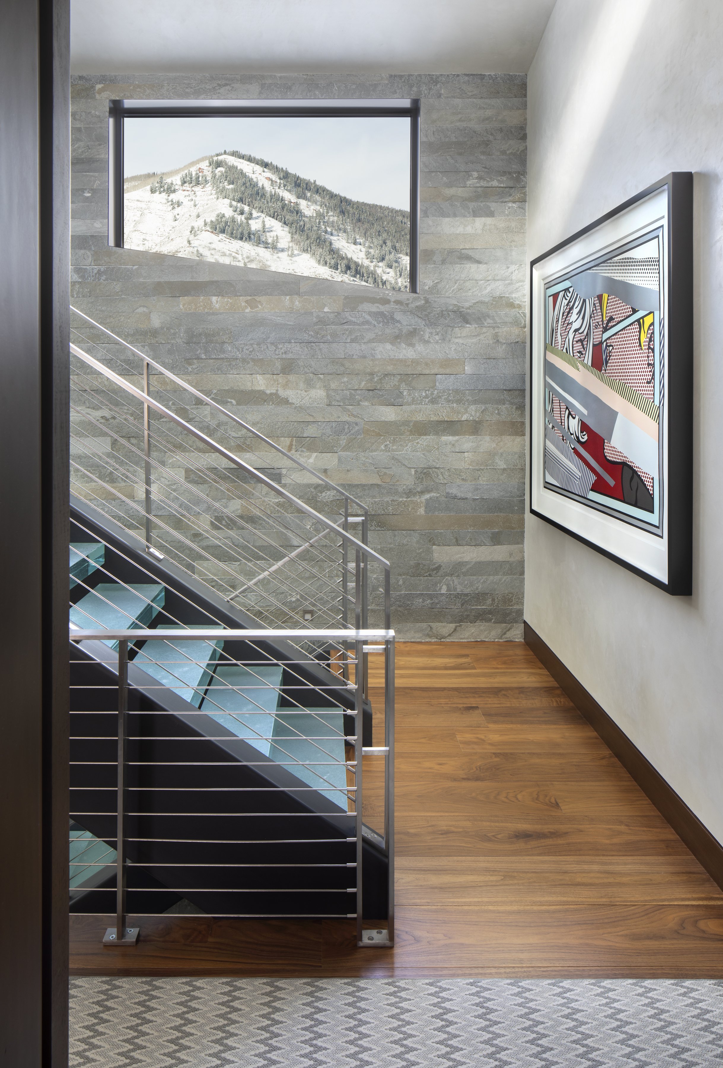 7-stairwell-largeprints-stainless-steel-brick-wood-accent-textured-vail-interiordesign.jpg