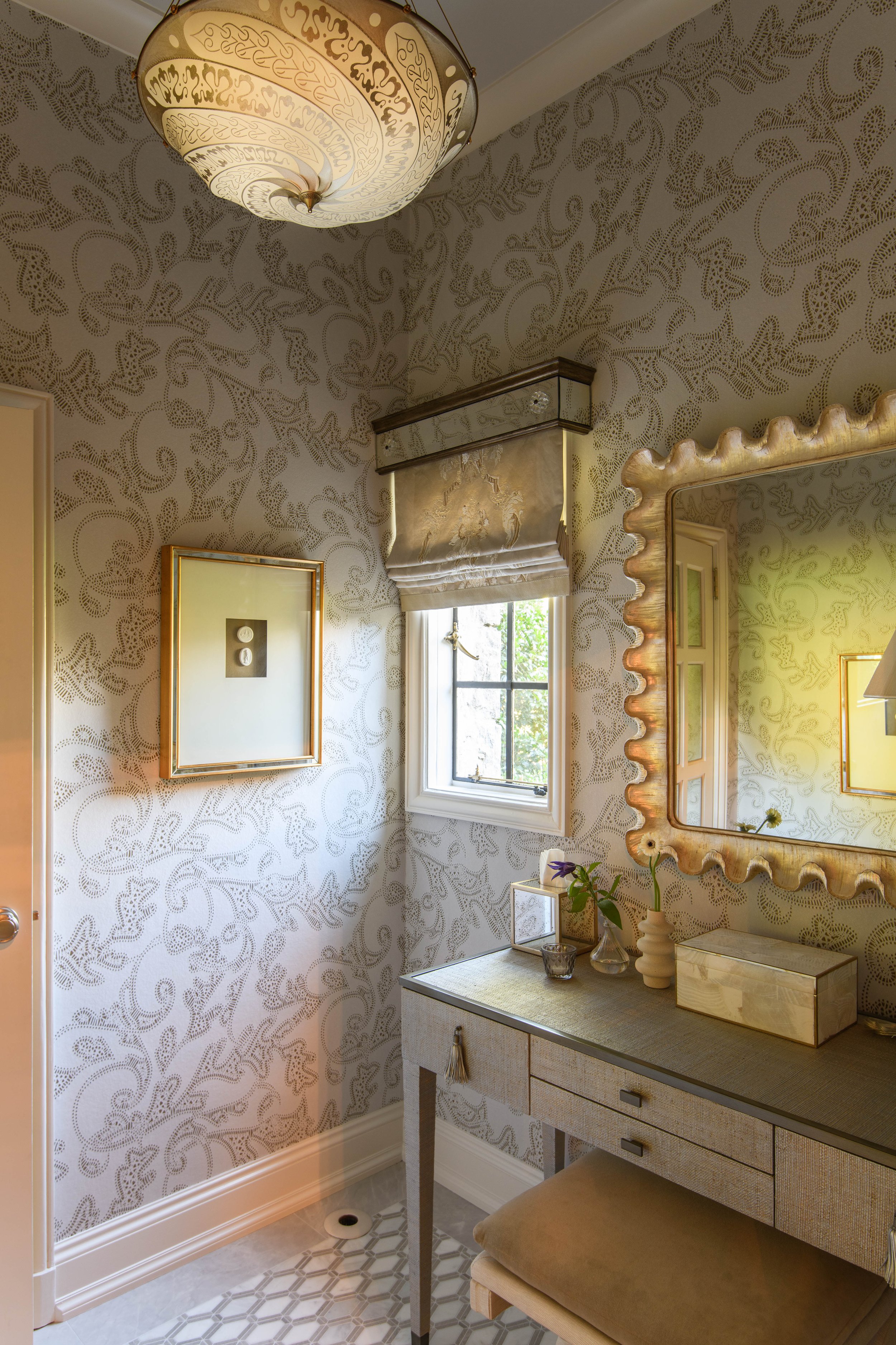 20-patterned-walls-gold-details-vanity-interesting-mirror-light-fixture-westechester-rinfret-interior-designs.jpg