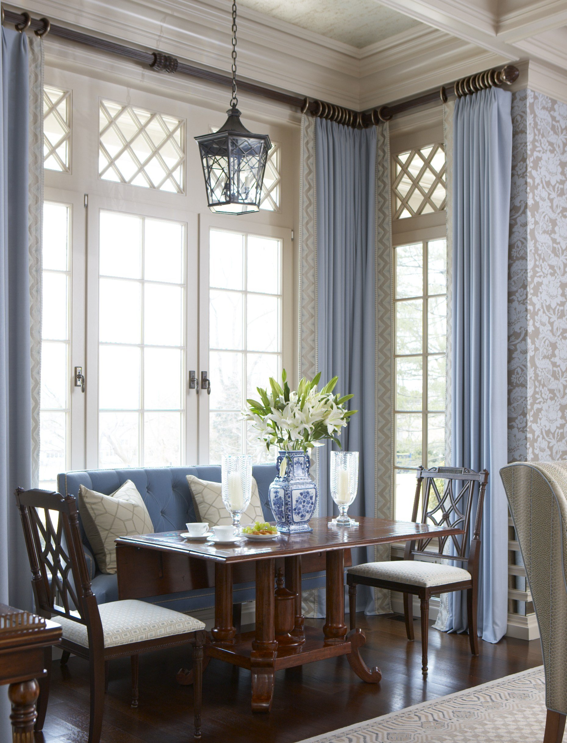 11-chic-Dinette-tall-window-dark-wood-blue-patterns-jacobean-country-house-rinfret-interior-designs.jpg