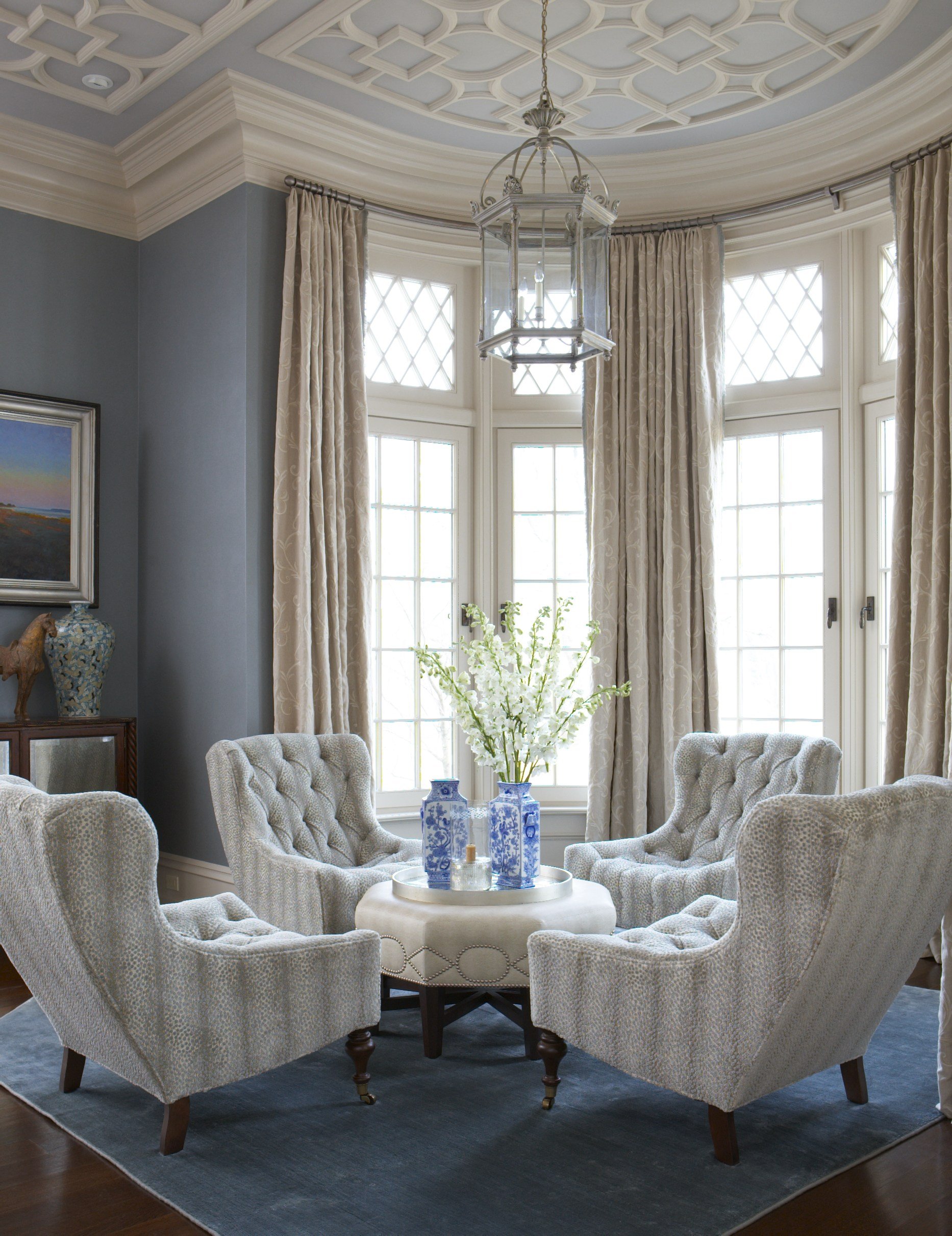 6-dreamy-seating-area-white-textured-chairs-high-windows-cream-blue-details-rinfret-interior-designs.jpg