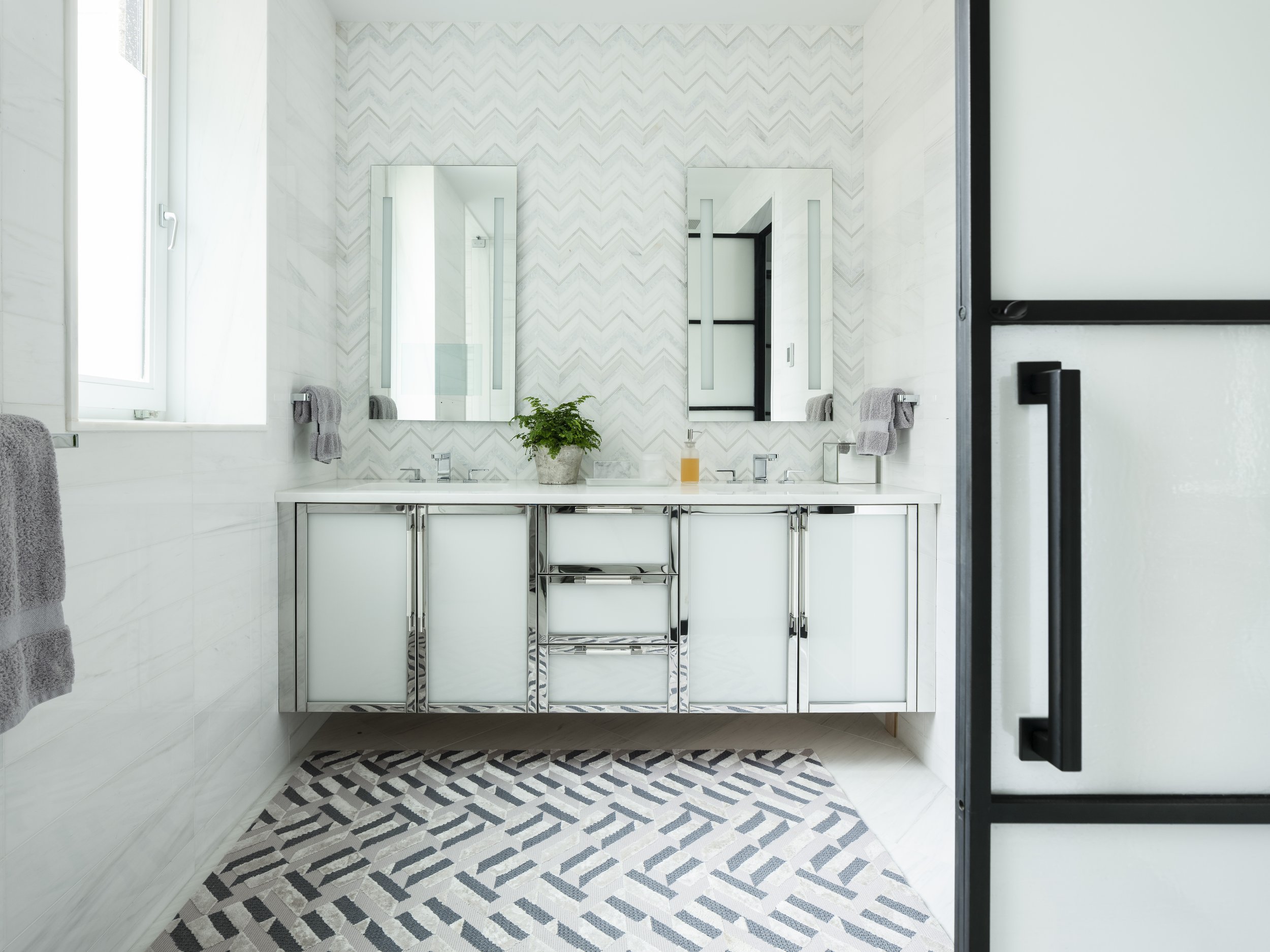27-simple-clean-glass-bathroom-sink-white-silver-detailing-manhattan-penthouse-rinfret-interior-designs..jpg