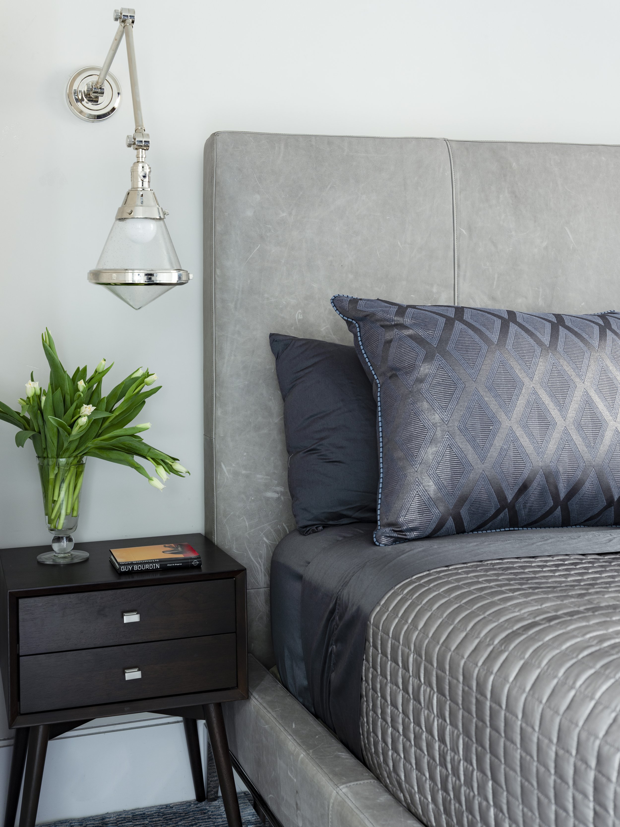 22-side-table-modern-aesthetic-blue-gray-textured-bedding-and-pillows-cool-side-light-manhattan-penthouse-rinfret-interior-designs..jpg