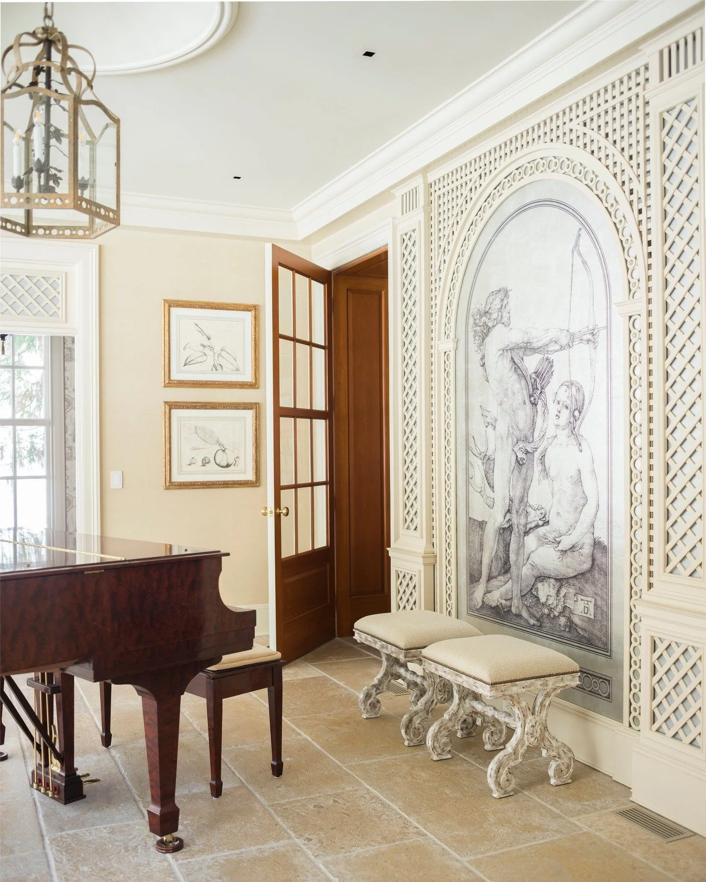How stunning is this sunroom with its exquisite &eacute;glomis&eacute; panels based on Diana the Huntress and framed in custom treillage? 

This space is part of our beloved &quot;Greenwich Elegance&quot; project &mdash; one of our favorites due to t