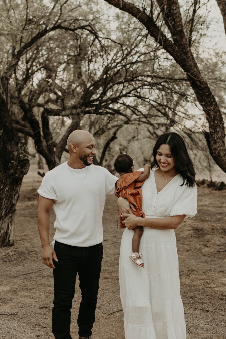 Jasmine with her husband and baby daughter, a mother and cycle breaker doing the healing work she guides clients through at Heal & Grow Therapy