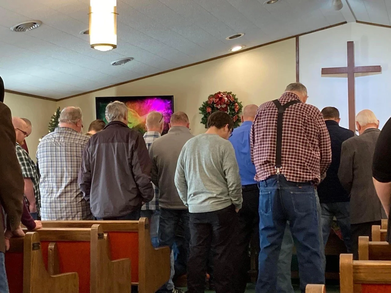 Nebo Naz praying men.jpg