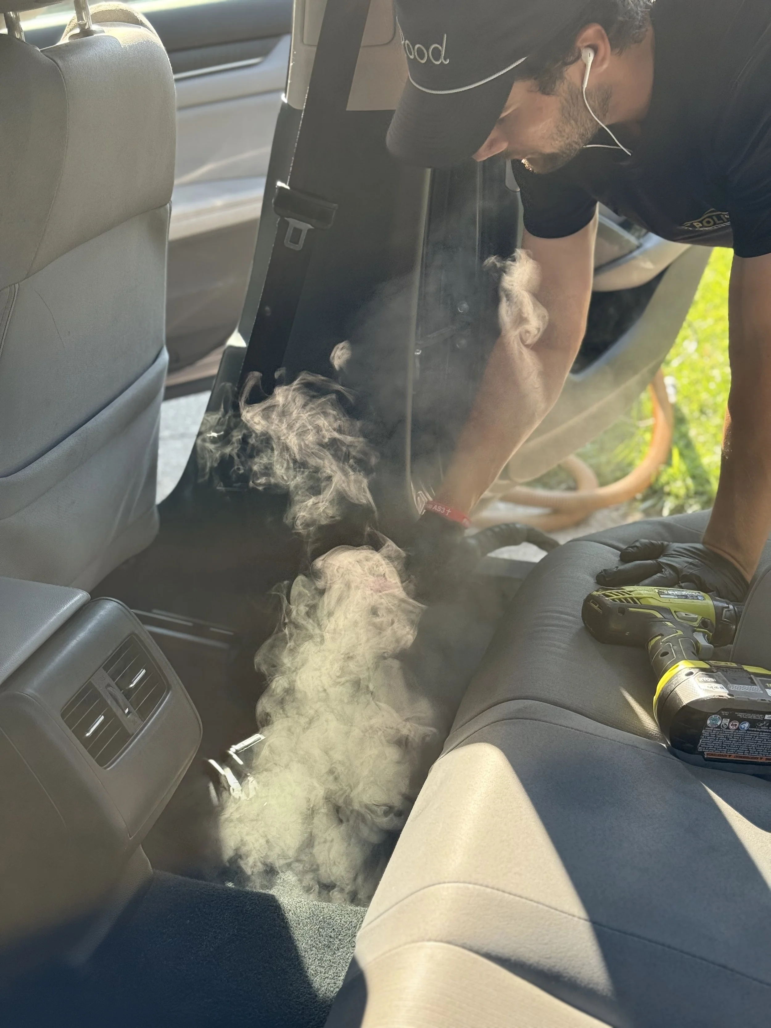 Interior car detailing steam cleaning