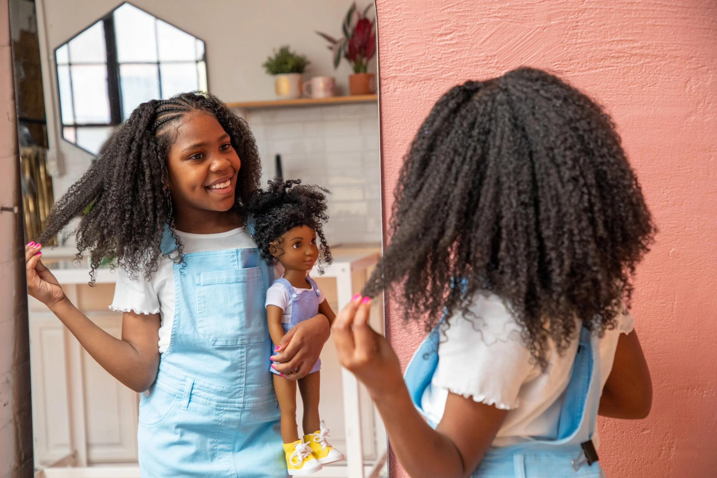 Image of products from Healthy Roots Doll, a bipoc style brand featured in Katie Colley's brand Library