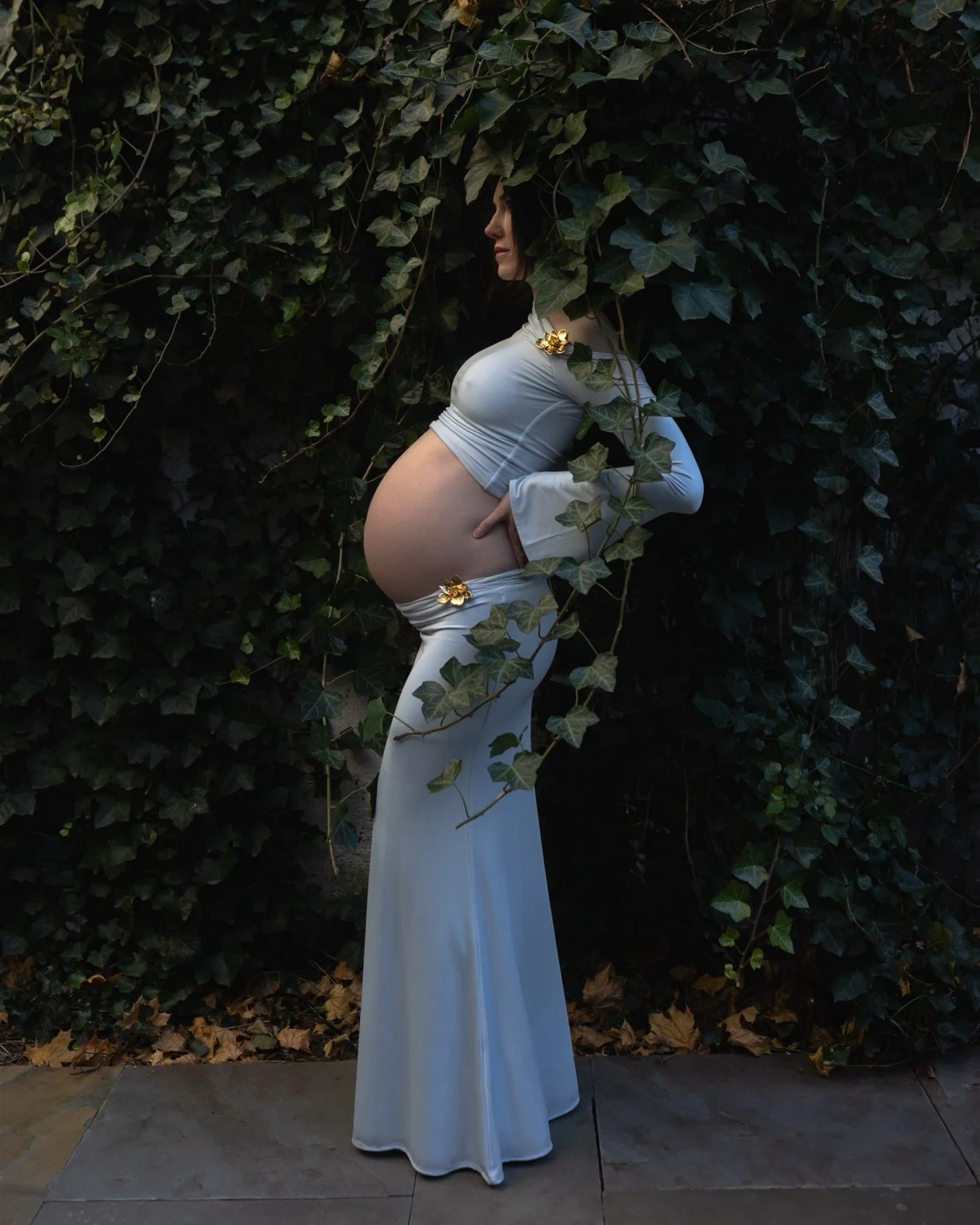 Carolyn in look 1 at home. We wandered in and out of what would someday soon be baby girl&rsquo;s nursery. I imagine Carolyn now, holding sweet Helena earthside in this very doorway, spring breeze floral &amp; soft. Sometimes that idyllic location fo